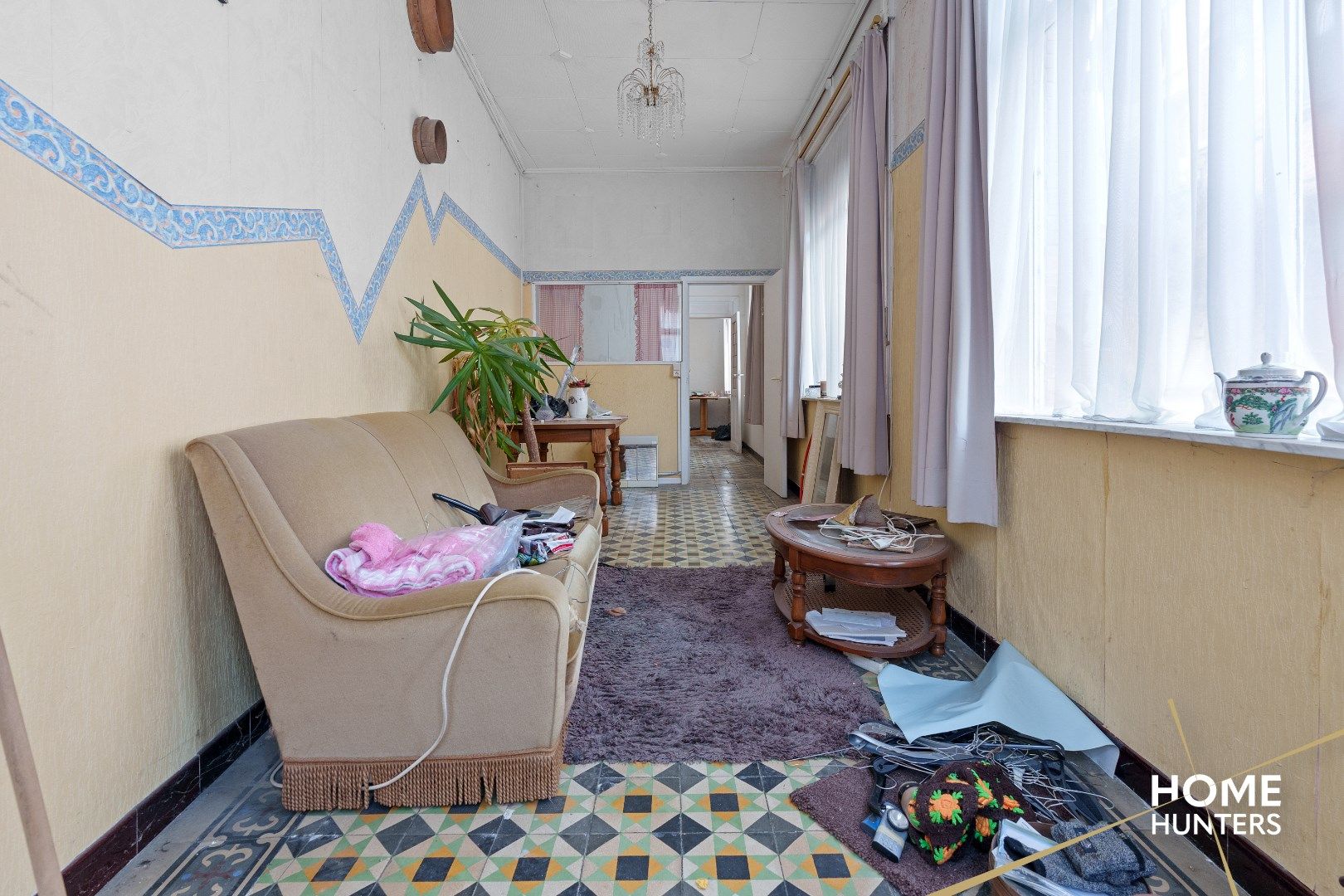 Te renoveren woning in het historische stadscentrum van Ieper foto 3