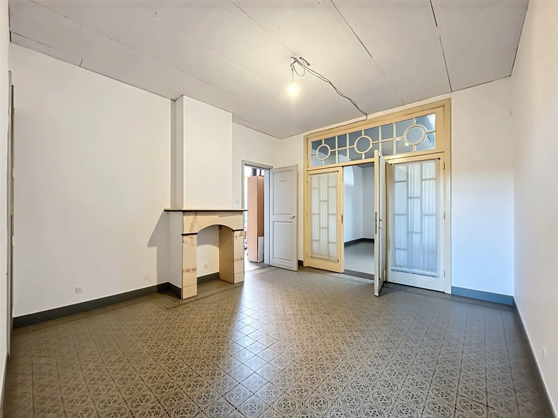 Opbrengsteigendom met 2 appartementen en een handelspand van 200 m² foto 13