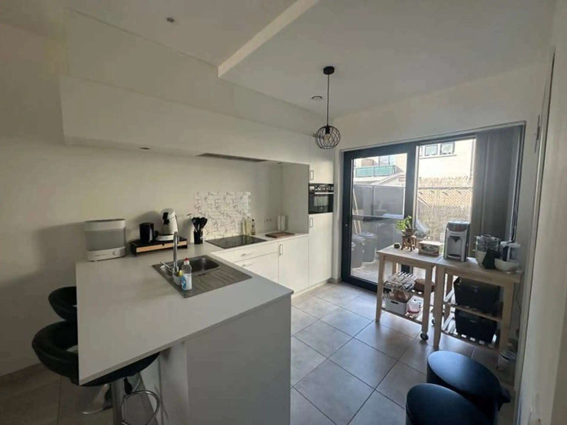 Gelijkvloersappartement met ondergrondse parking en tuintje foto 6