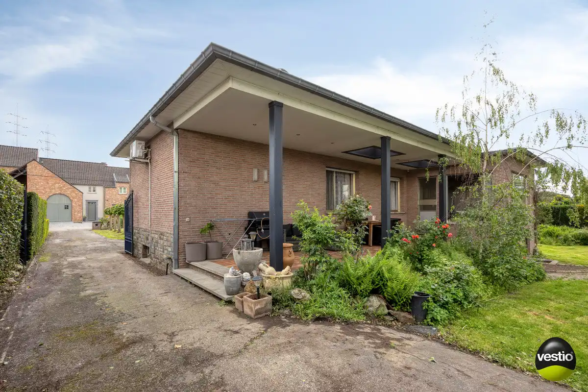 GELIJKVLOERSE WONING MET 3 SLK op 17A89CA NABIJ CENTRUM BILZEN. foto 35