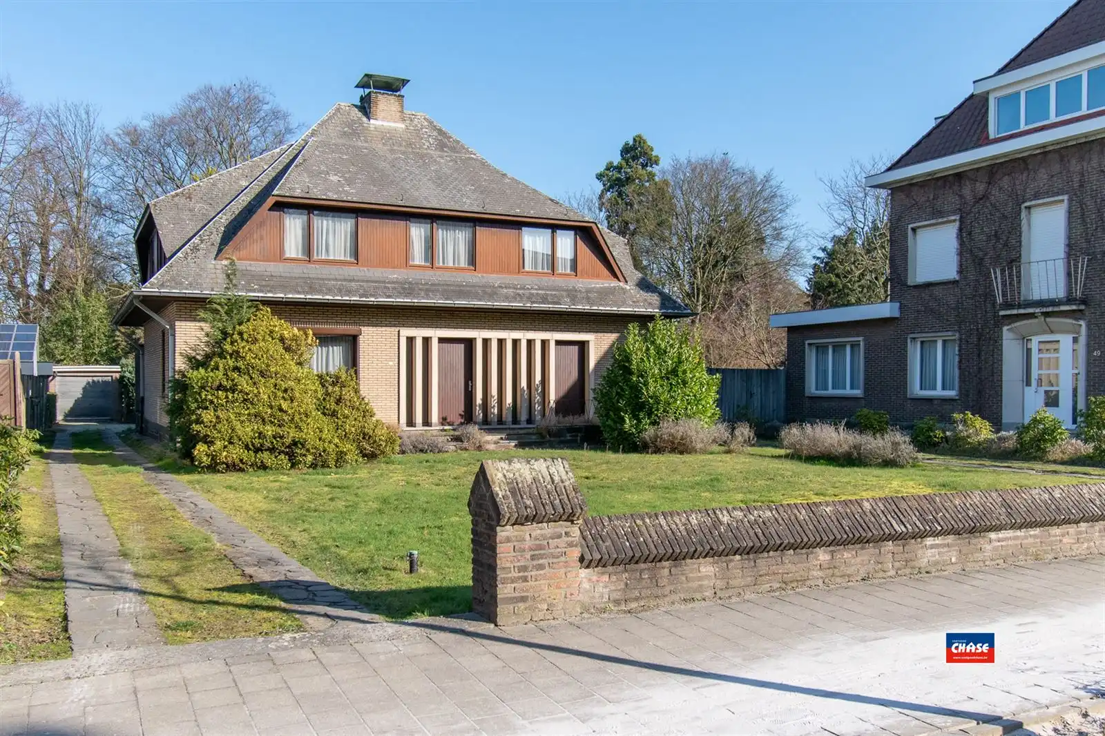 Ruime open gezinswoning met tuin en twee garageboxen  foto 2