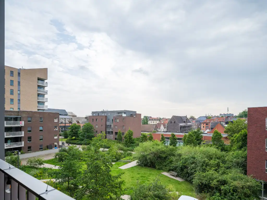 Lichtrijk appartement met ruim zonneterras en open groen zicht op toplocatie aan Dok Noord. Mogelijkheid aankoop autostaanplaats! foto 5