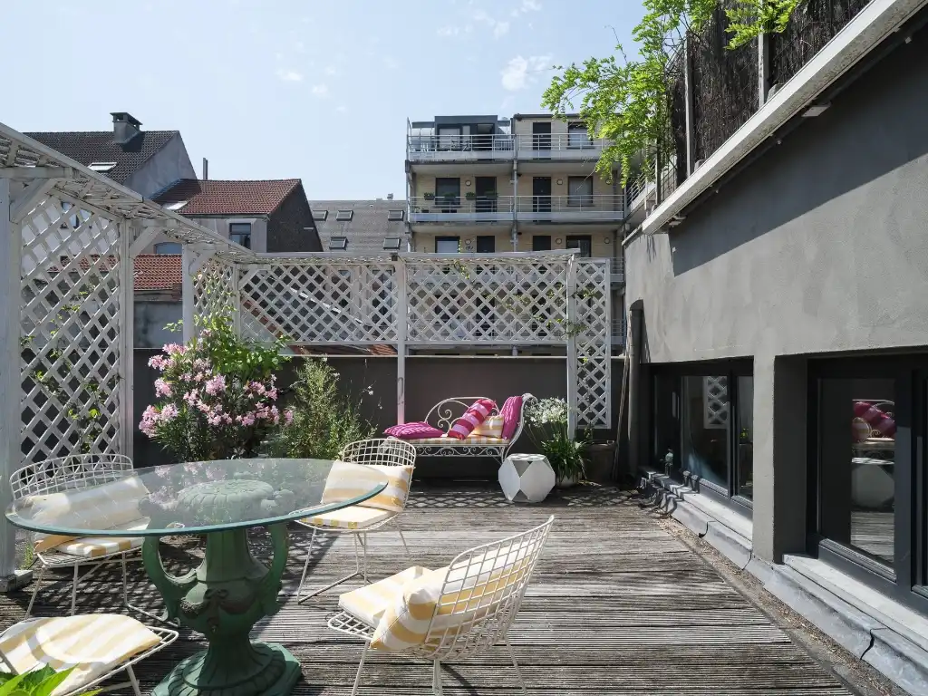 Imposant designappartement met loftallures nabij het Wintercircus en De Krook foto 6