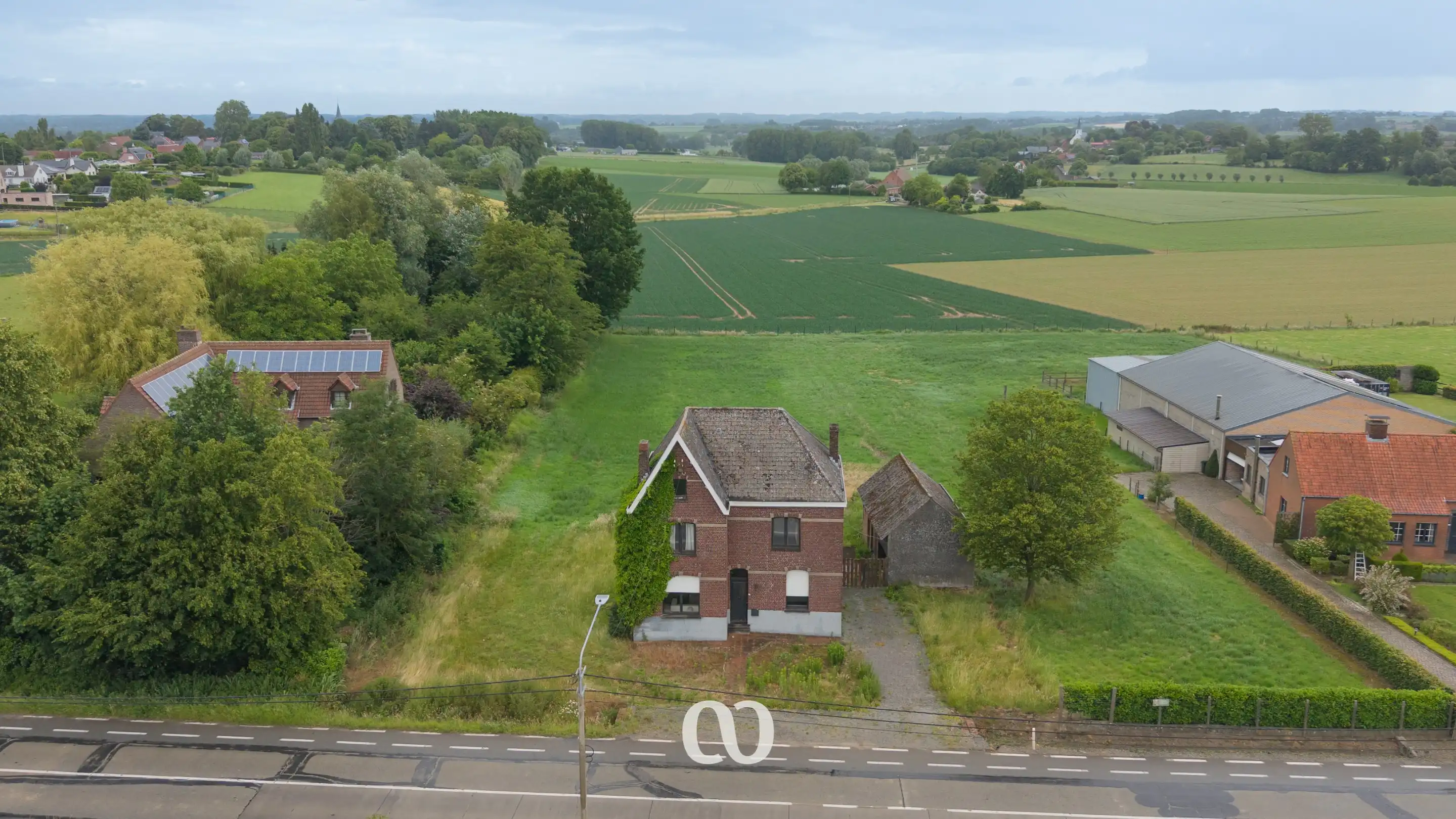 Hoofdfoto van de publicatie: Unieke eigendom met prachtig zicht over de Vlaamse Ardennen op een ruim perceel van 3.310 m² in Horebeke