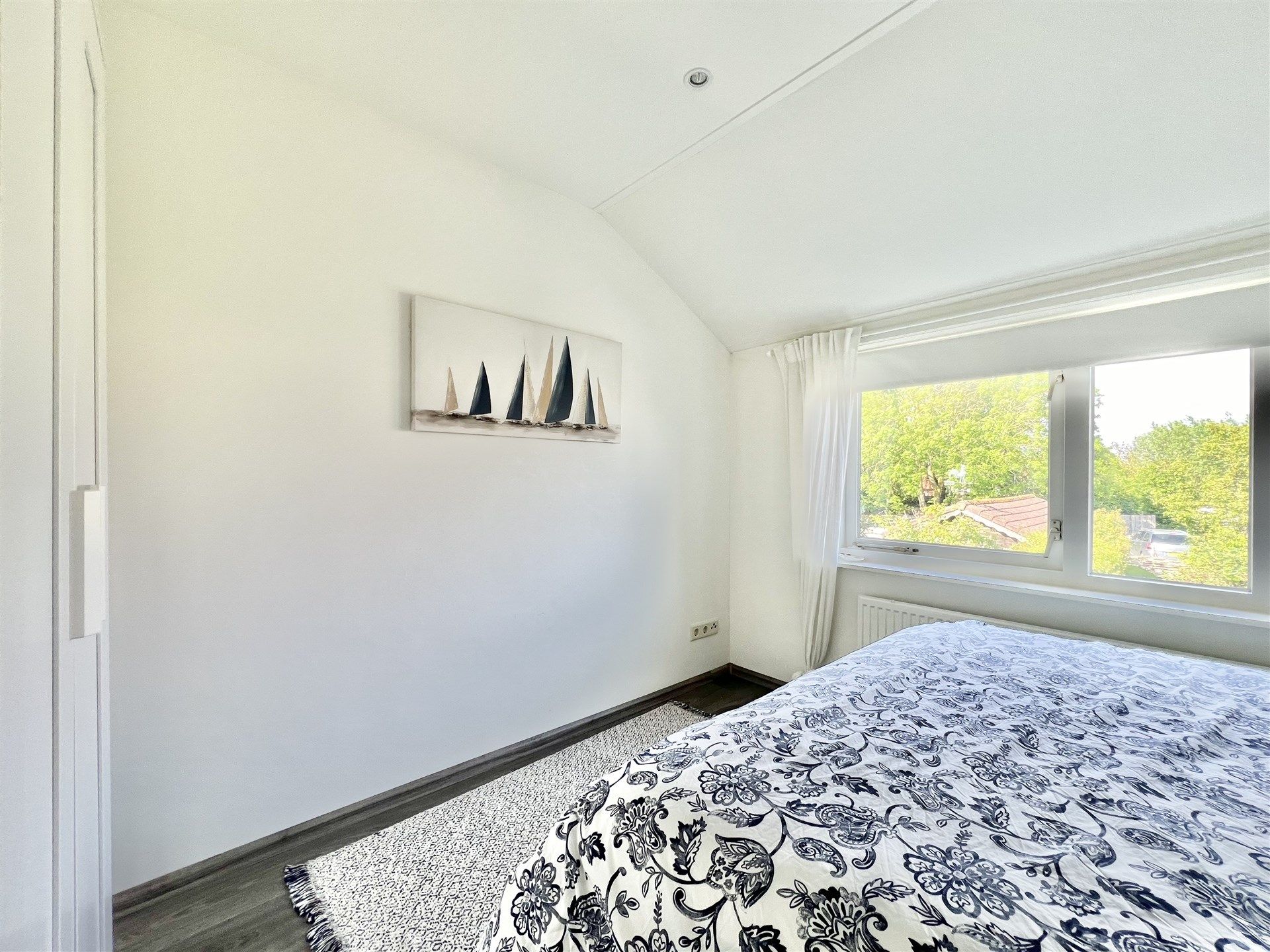 Charmante woning met drie slaapkamers en tuin foto 8