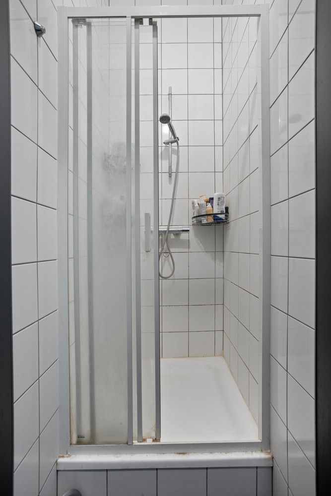 Opbrengsteigendom met 5 studentenkamers op toplocatie in hartje Leuven foto 7