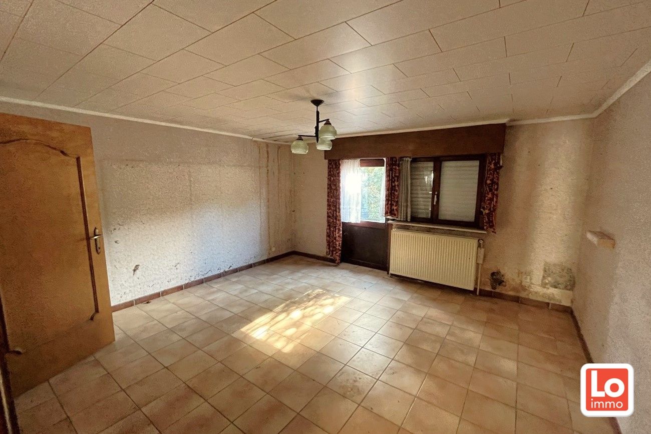 Te renoveren woning met 3 slaapkamer en tuin op een topligging in Centrum Lochristi foto 11