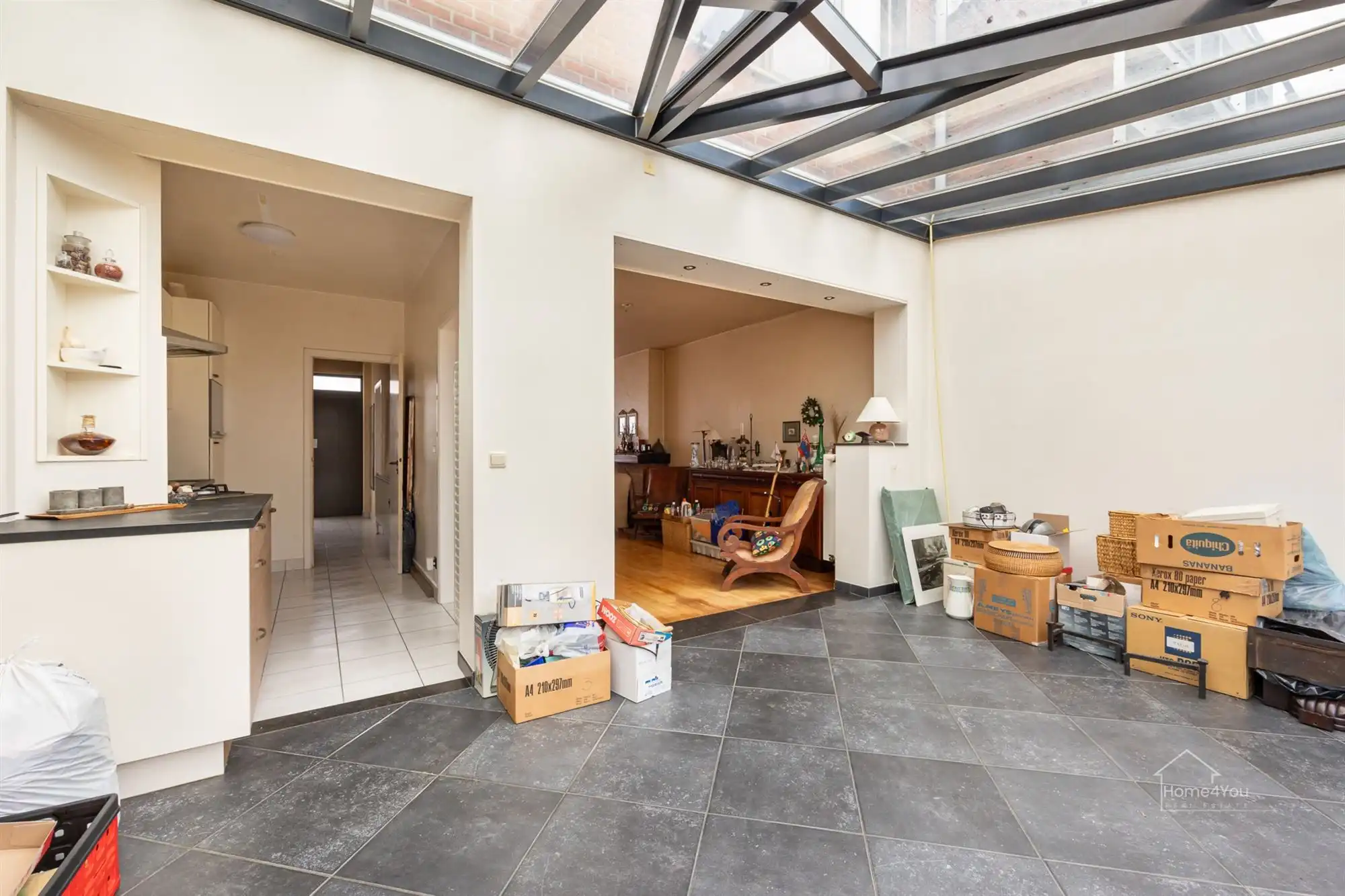 Ruime rijwoning op toplocatie met zongerichte tuin foto 8