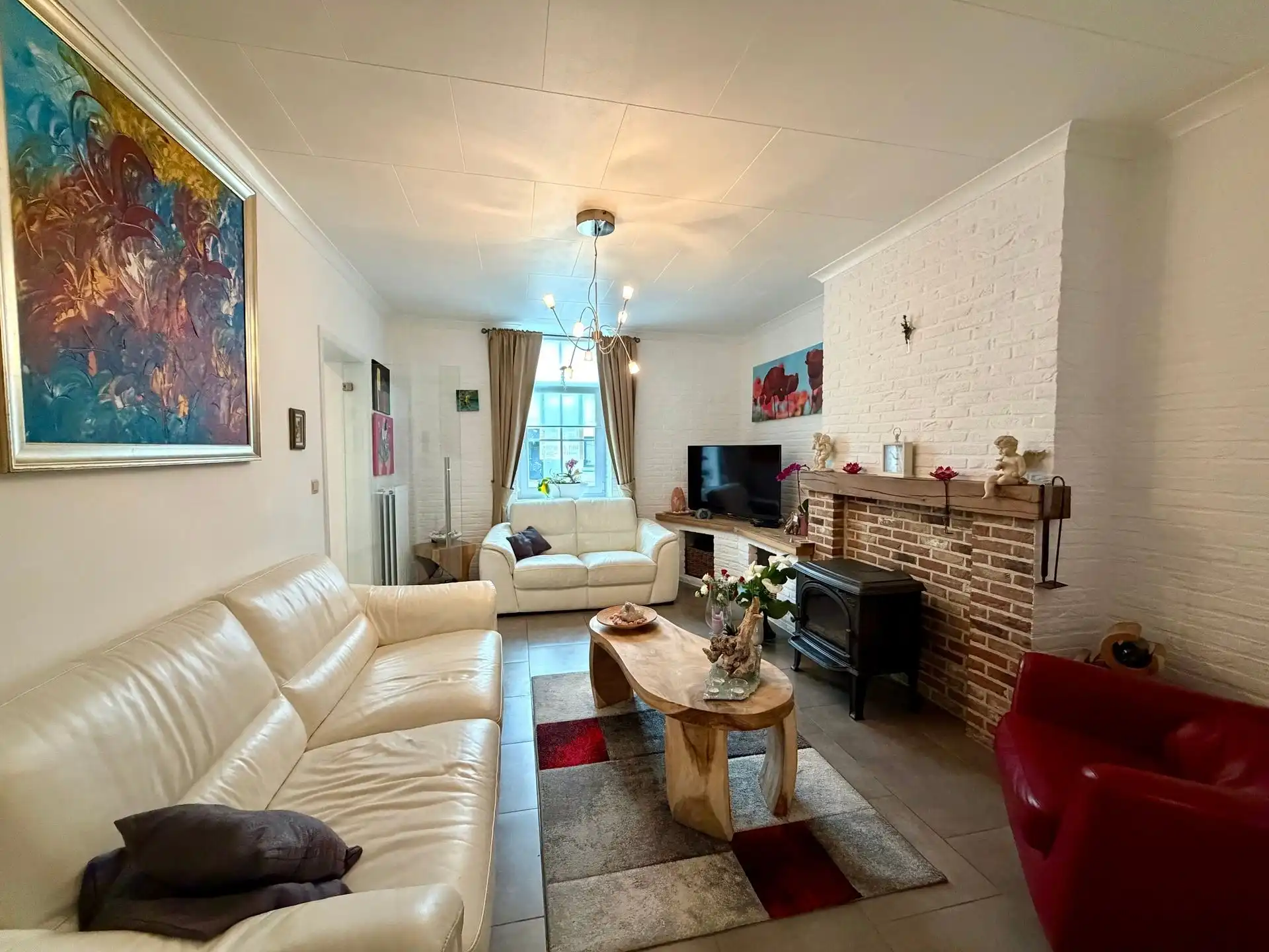 Charmante gezinswoning met 3 slaapkamers, afgewerkte zolder, garage en een unieke ligging. foto 5