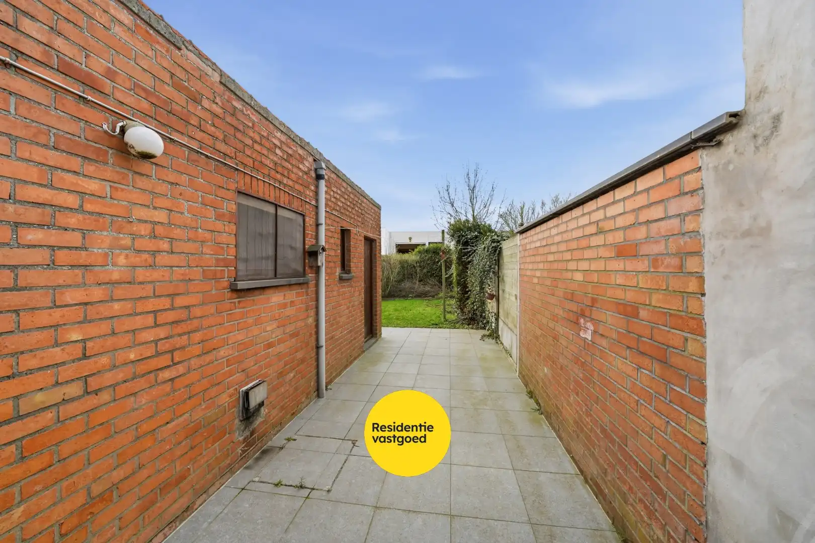 Te renoveren woning met 3 slaapkamers en tuin in Zandvoorde (Oostende) foto 3