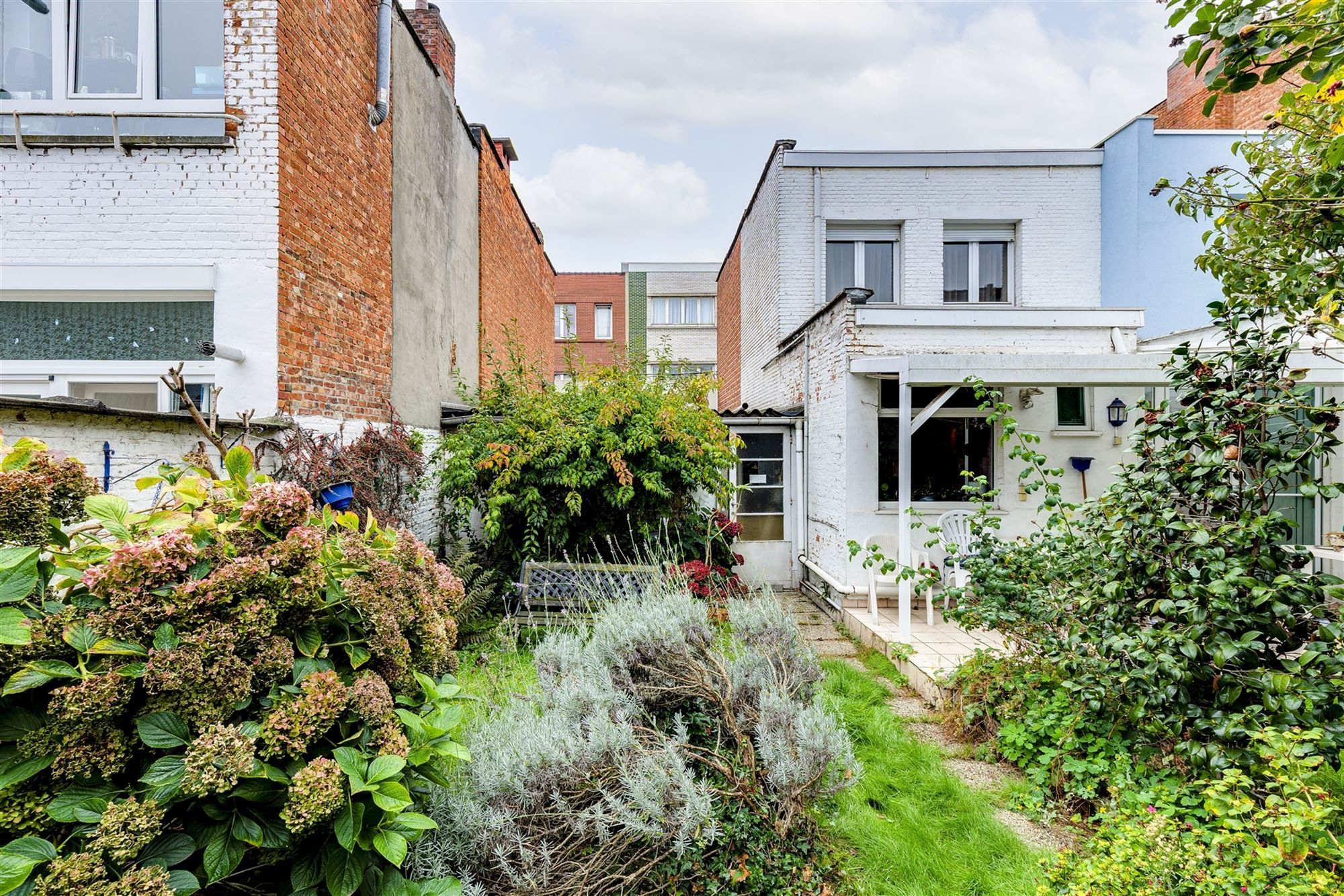 Te renoveren woning met tuin in Merksem foto 18