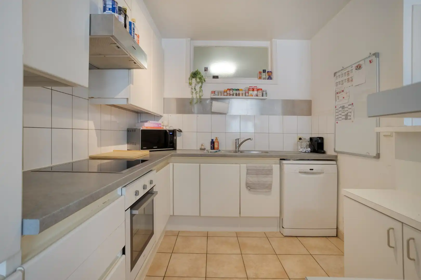 Leuk 2 slaapkamerappartement in het centrum van Wevelgem! foto 8