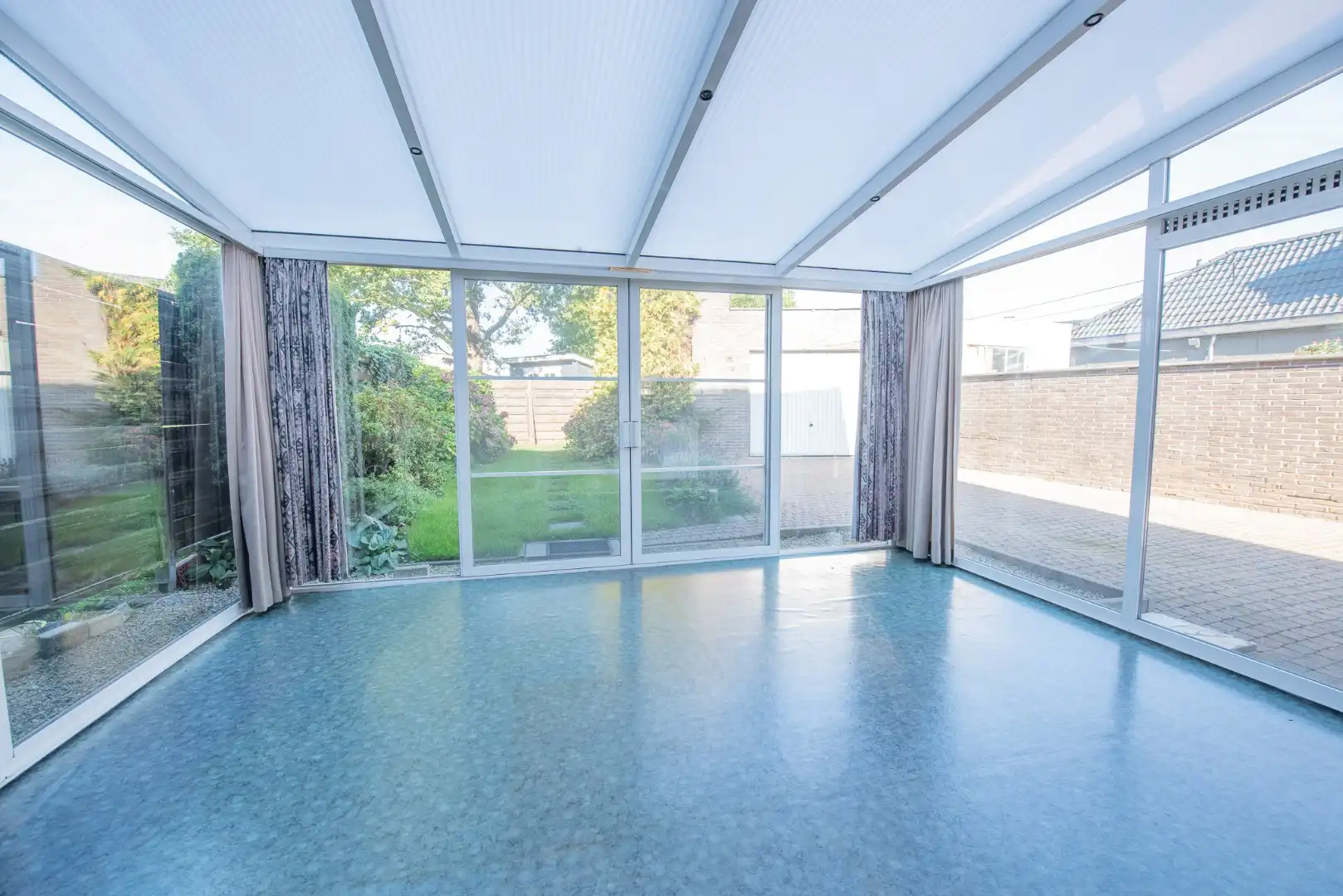 Praktische woning met 3 slaapkamers, garage, veranda en leuke tuin in centrum Wontergem foto 5
