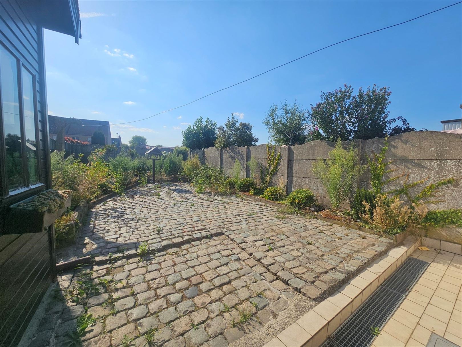Half-open bebouwing met garage en tuin foto 16