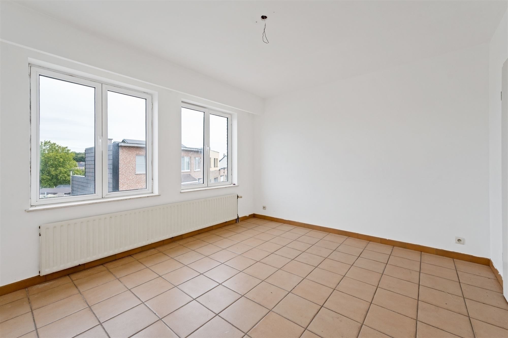 Opbrengsteigendom - 2 appartementen + handelspand te Lier foto 6