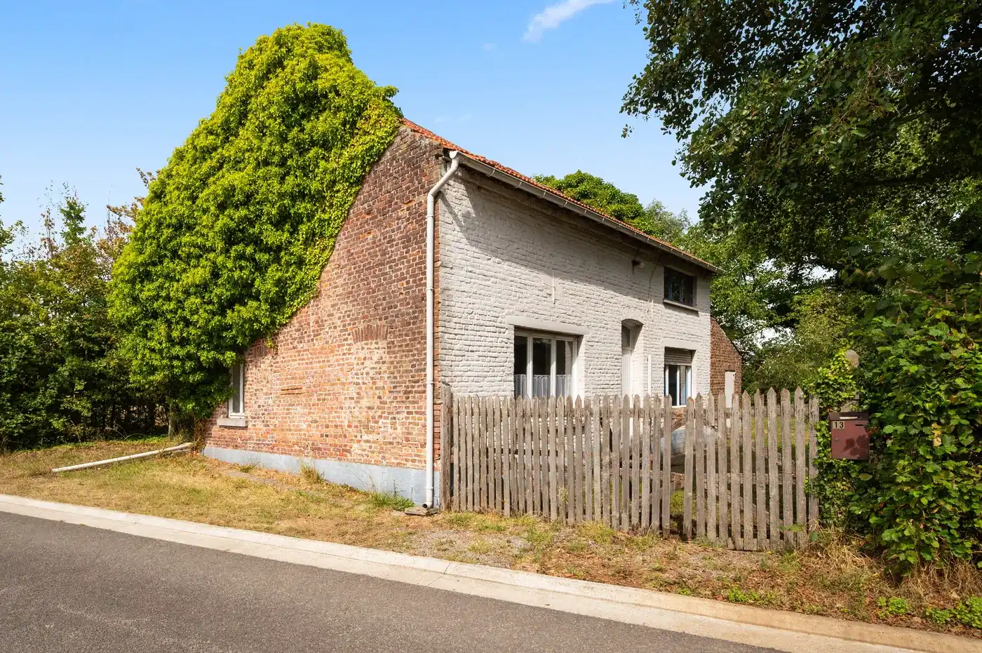 Open bebouwing in Linter met groot perceel en tuin foto 6
