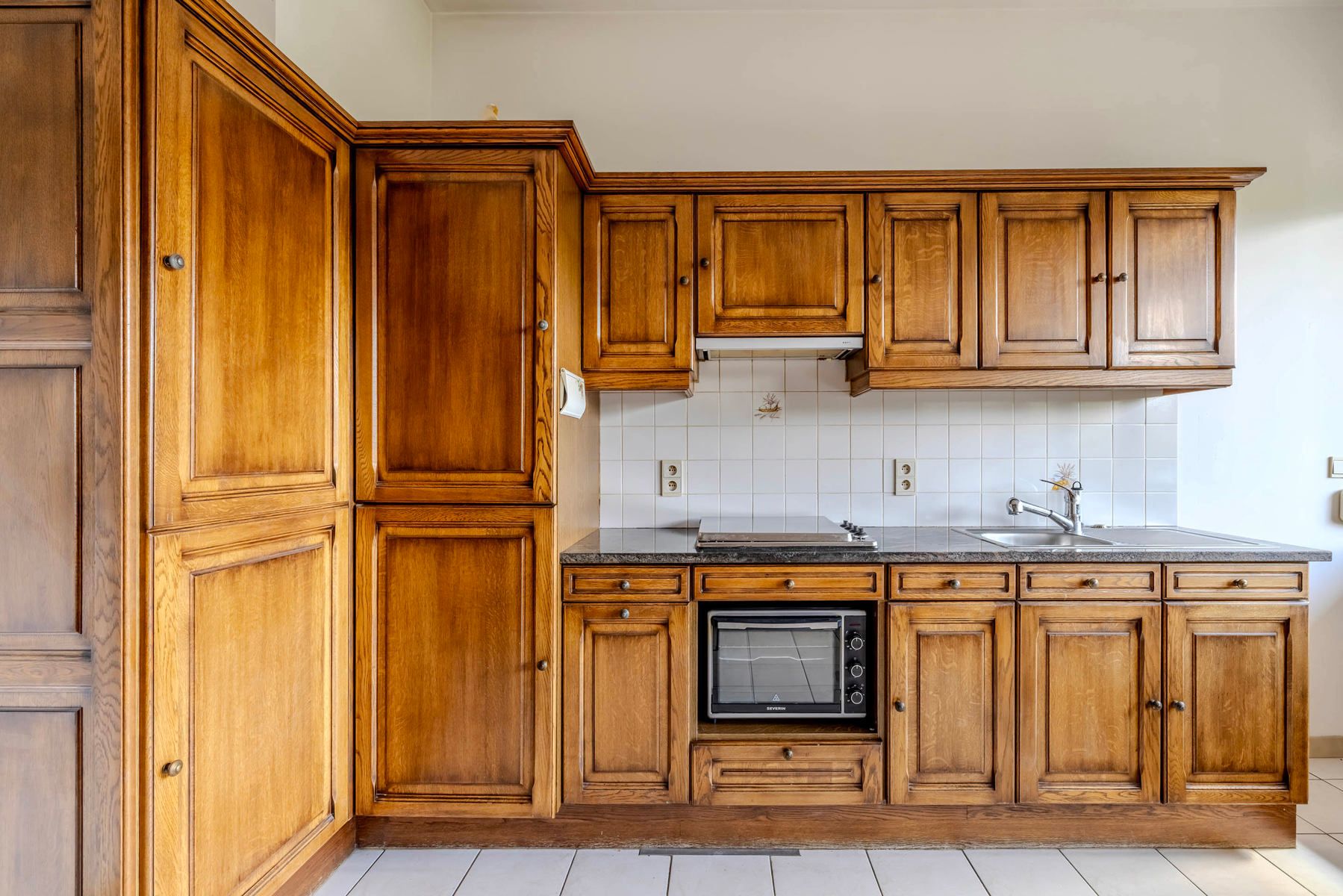 Gelijkvloers appartement met grote stadstuin foto 11