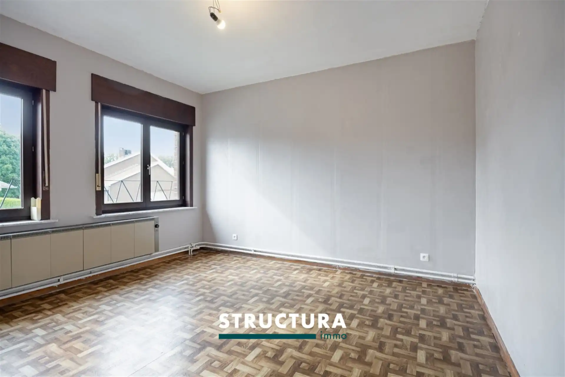 Gezinswoning met potentieel en 4 slaapkamers nabij het centrum foto 12