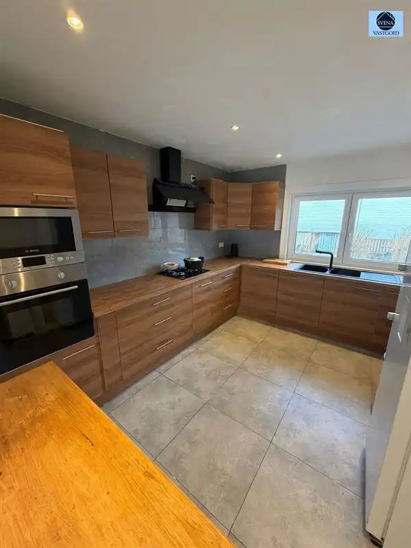 WONING MET HANDELSRUIMTE EN 3 SLAAPKAMERS foto 4