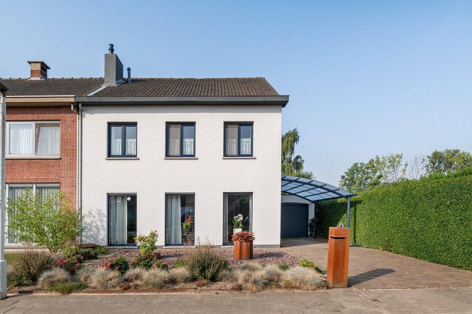Charmante halfopen woning met 3 slaapkamers met ruime tuin in een doodlopende straat te Burcht! foto 28
