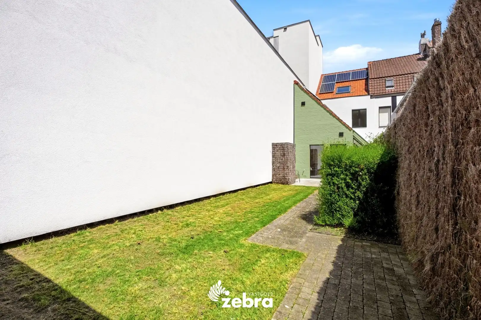 Stijlvolle woning met garage en achterliggende uitweg! foto 21