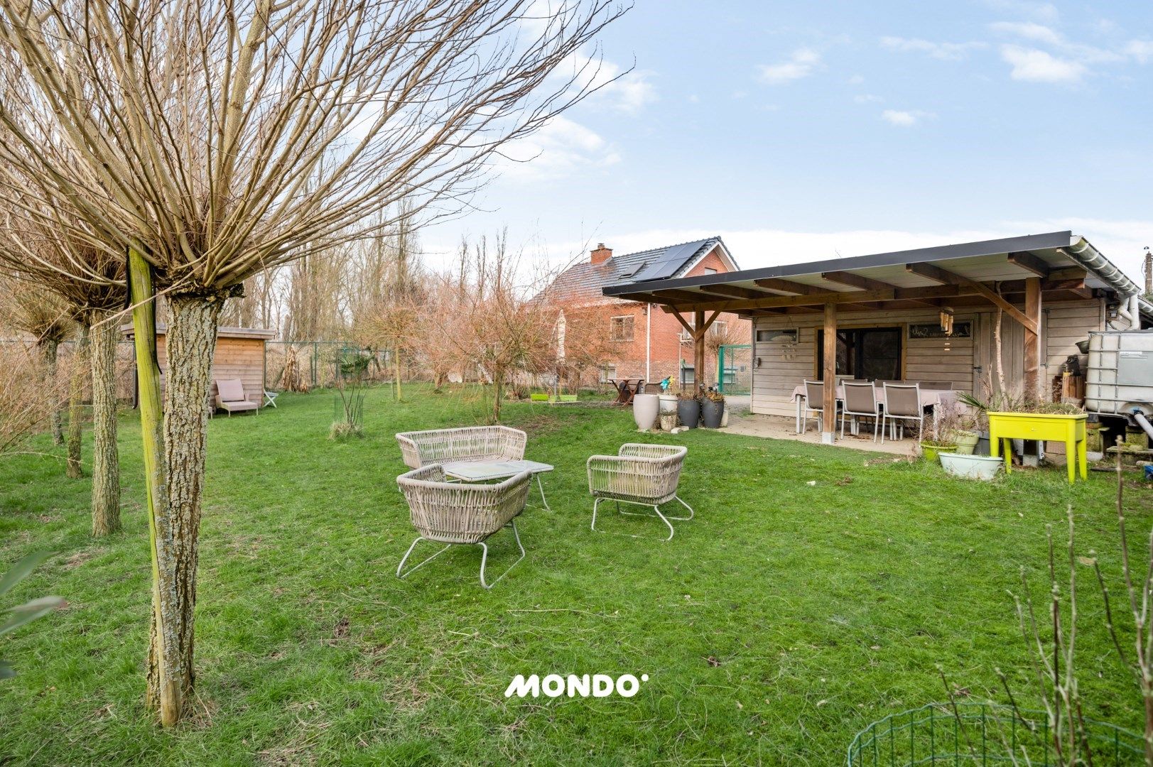 Vrijstaande woning met rondomtuin in rustige bosomgeving foto 2