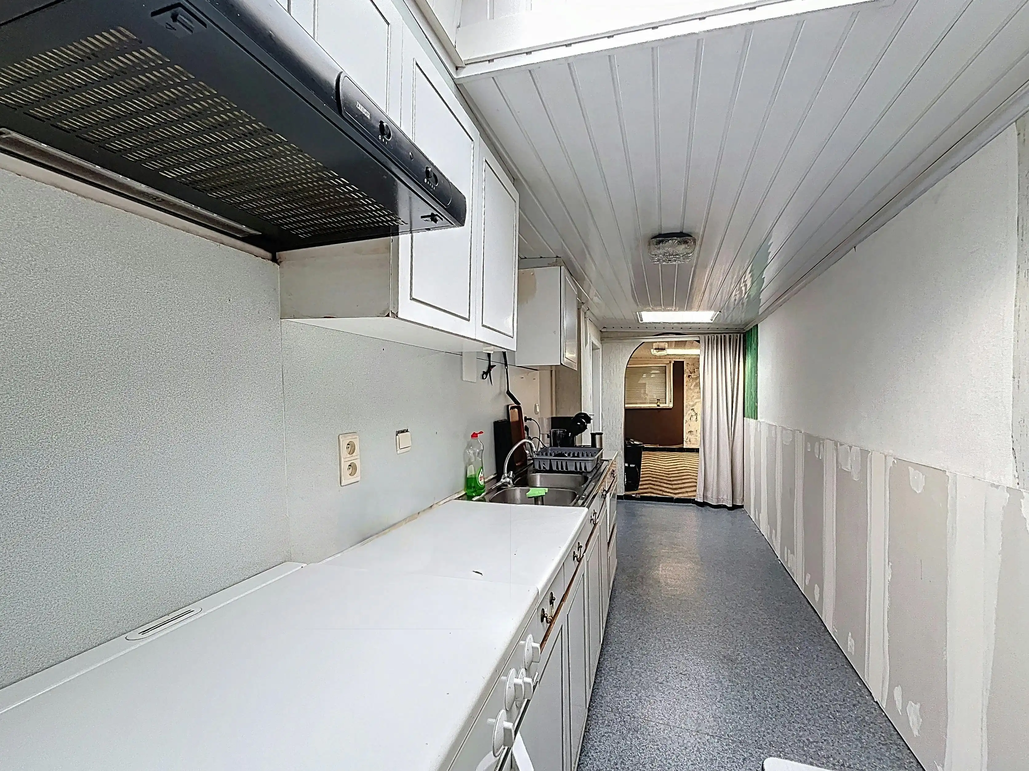 Te renoveren woning in het centrum van Ursel foto 5