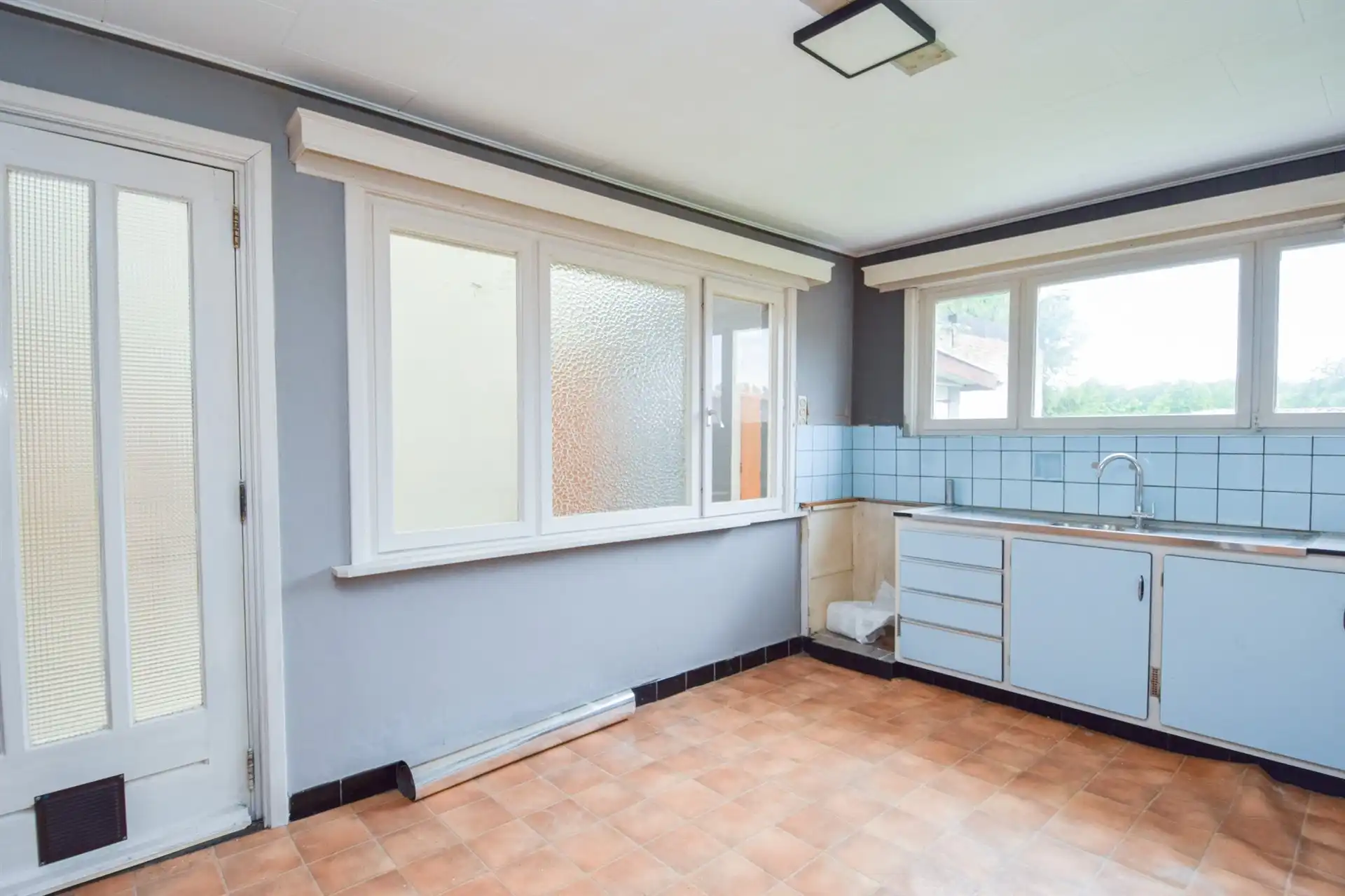 Te renoveren gezinswoning met ruime tuin in de dorpskern van De Klinge foto 9