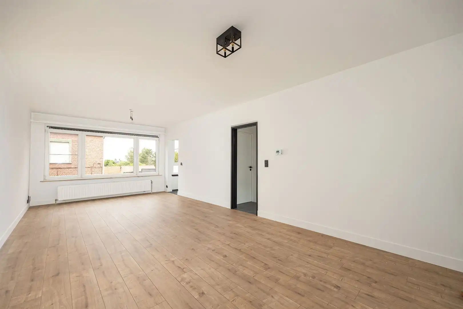 Gerenoveerd 2-slaapkamerappartement met garage in Kontich foto 2