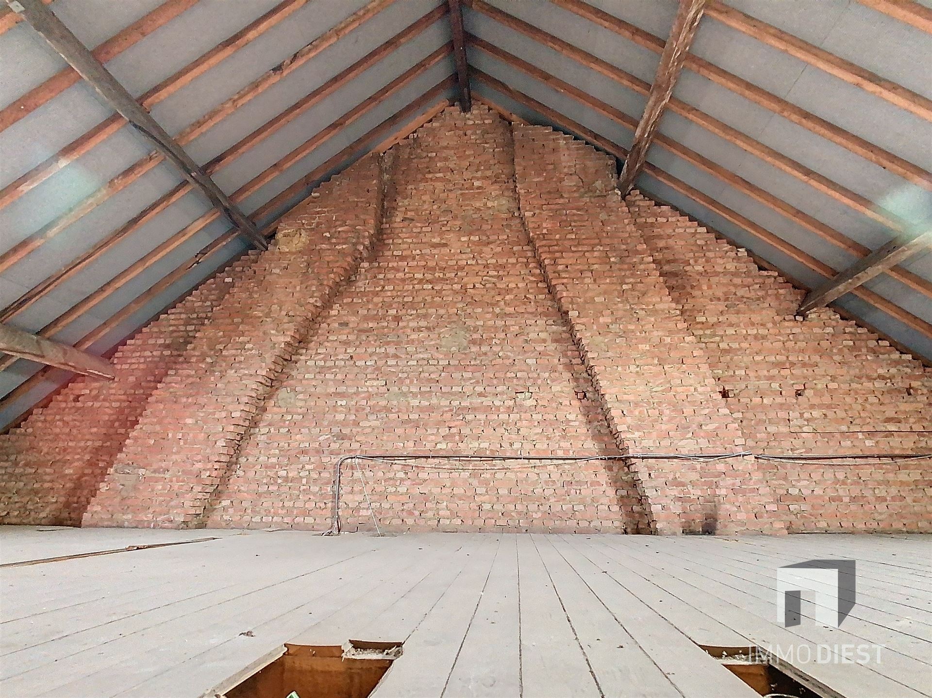 Karaktervolle rijwoning met stadstuin in hartje Scherpenheuvel op 2a 10ca. foto 19