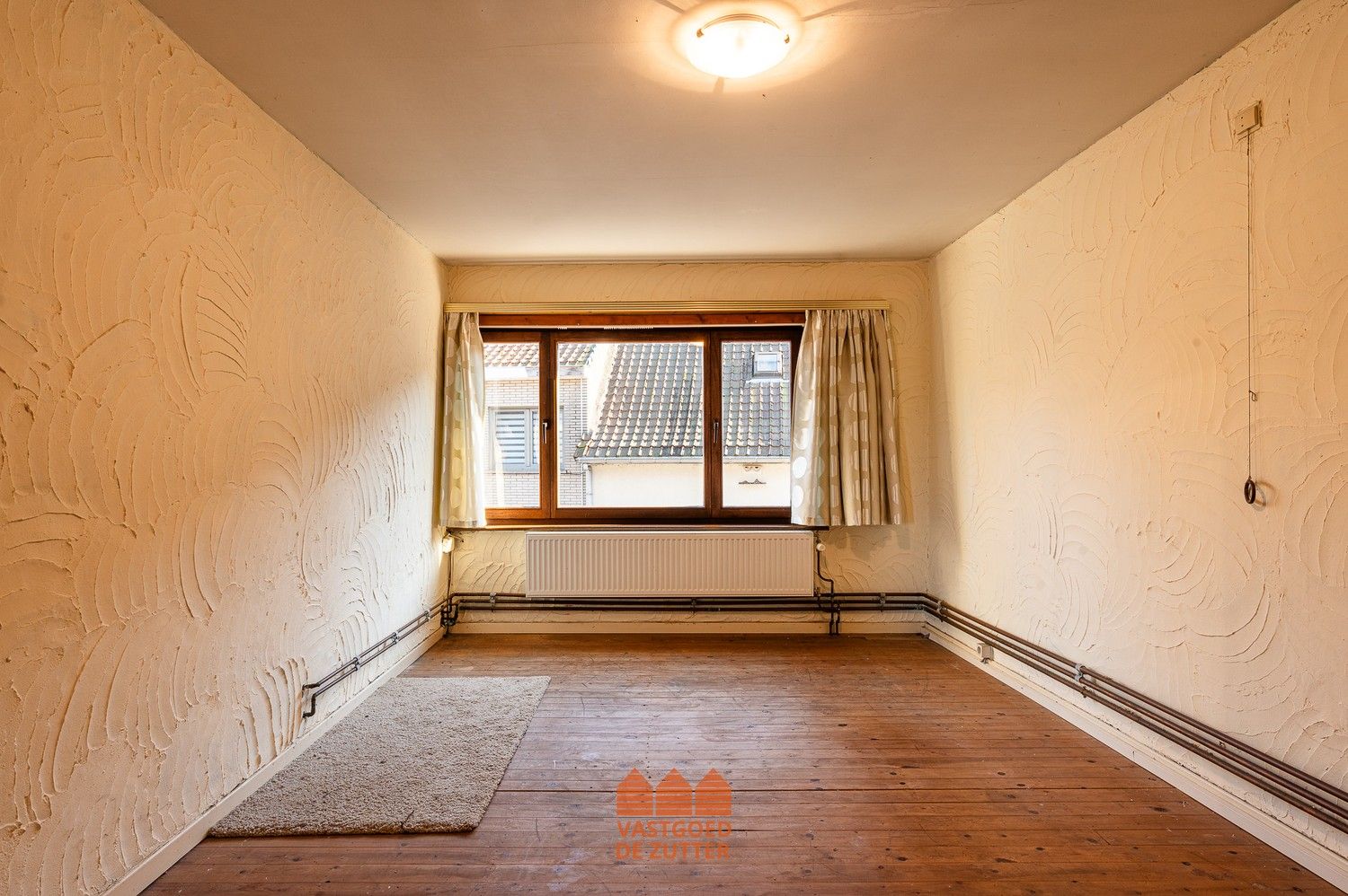 Ruime woning met handelspand in het centrum van Boekhoute foto 12