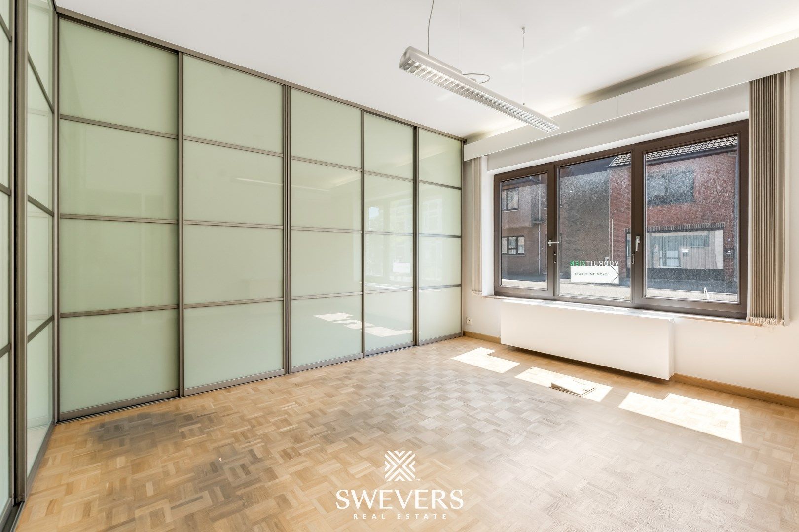 Veelzijdig handelspand op toplocatie in het centrum van Beringen foto 17