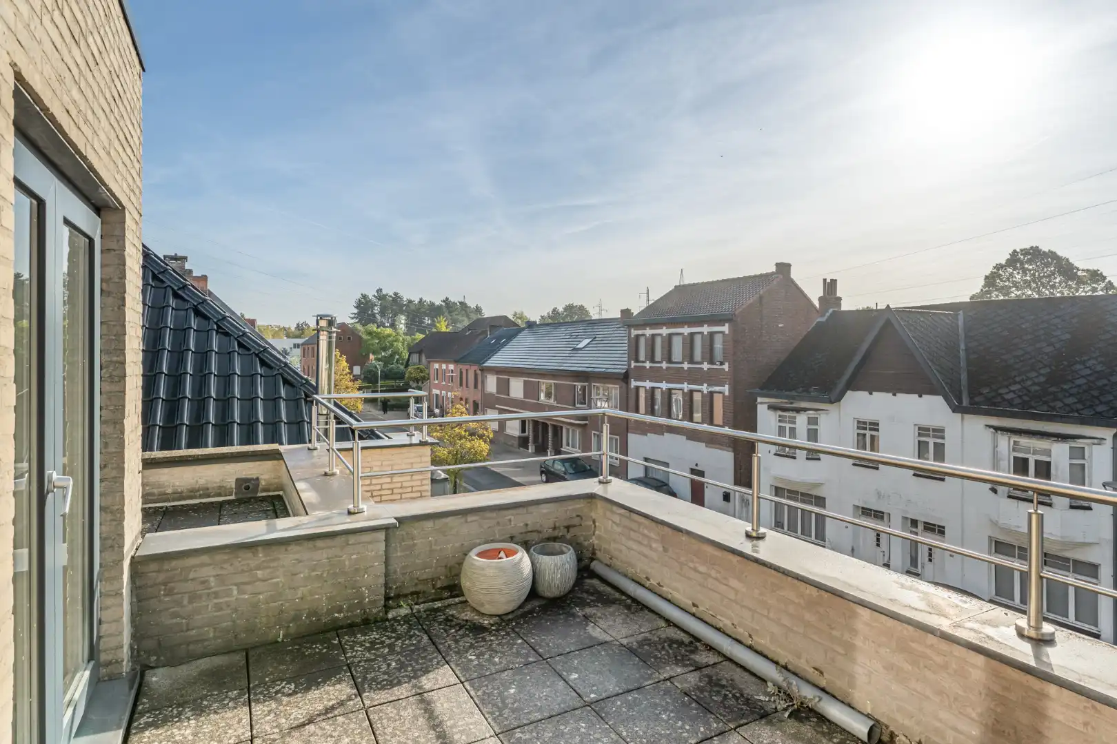 Exclusief penthouse met ruim terras, 2 slpk, extra brede autostaanplaats, centrum Houthalen foto 18