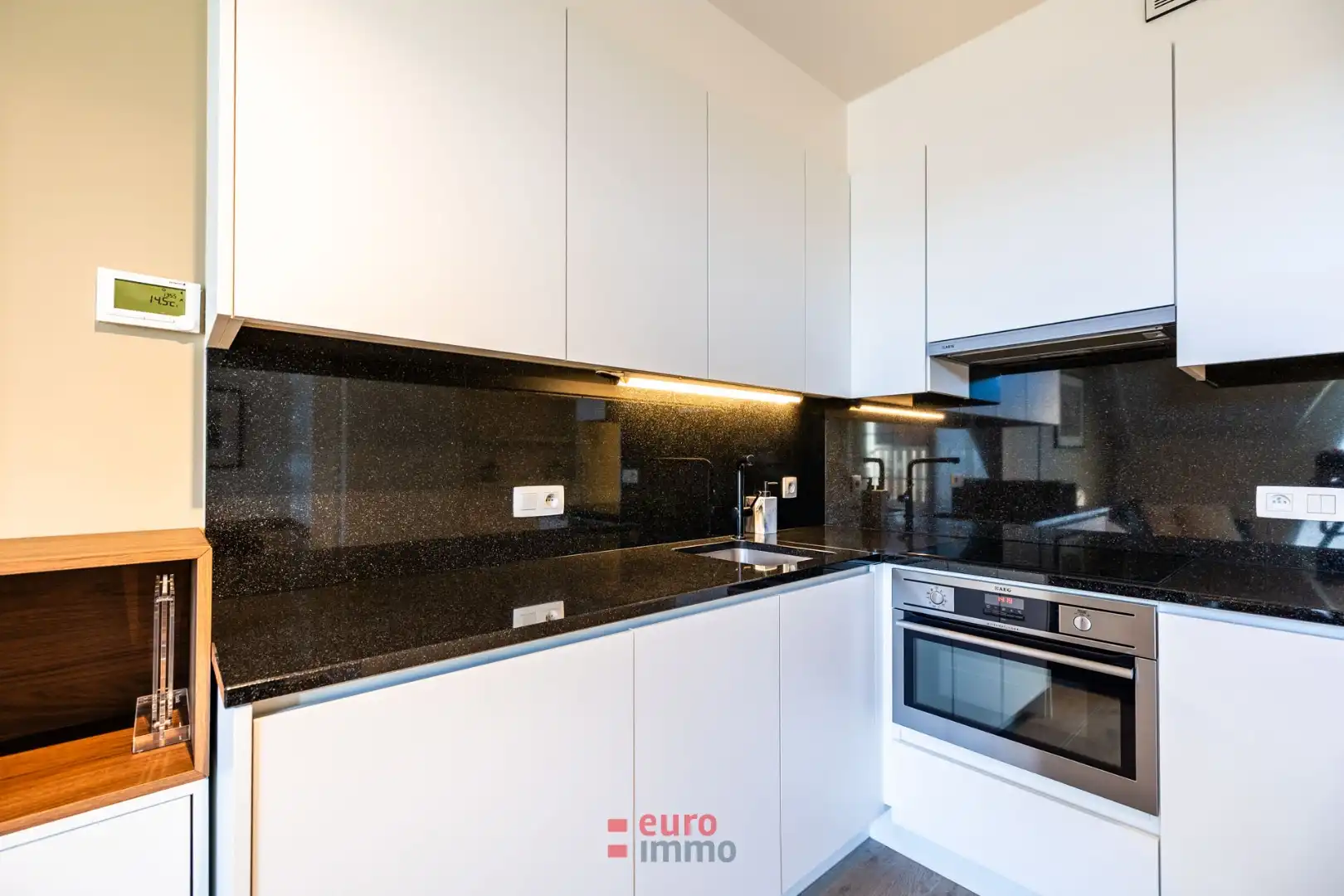 Exclusief duplex-appartement met 2 slaapkamers in het hartje van onze bruisende badstad! foto 7