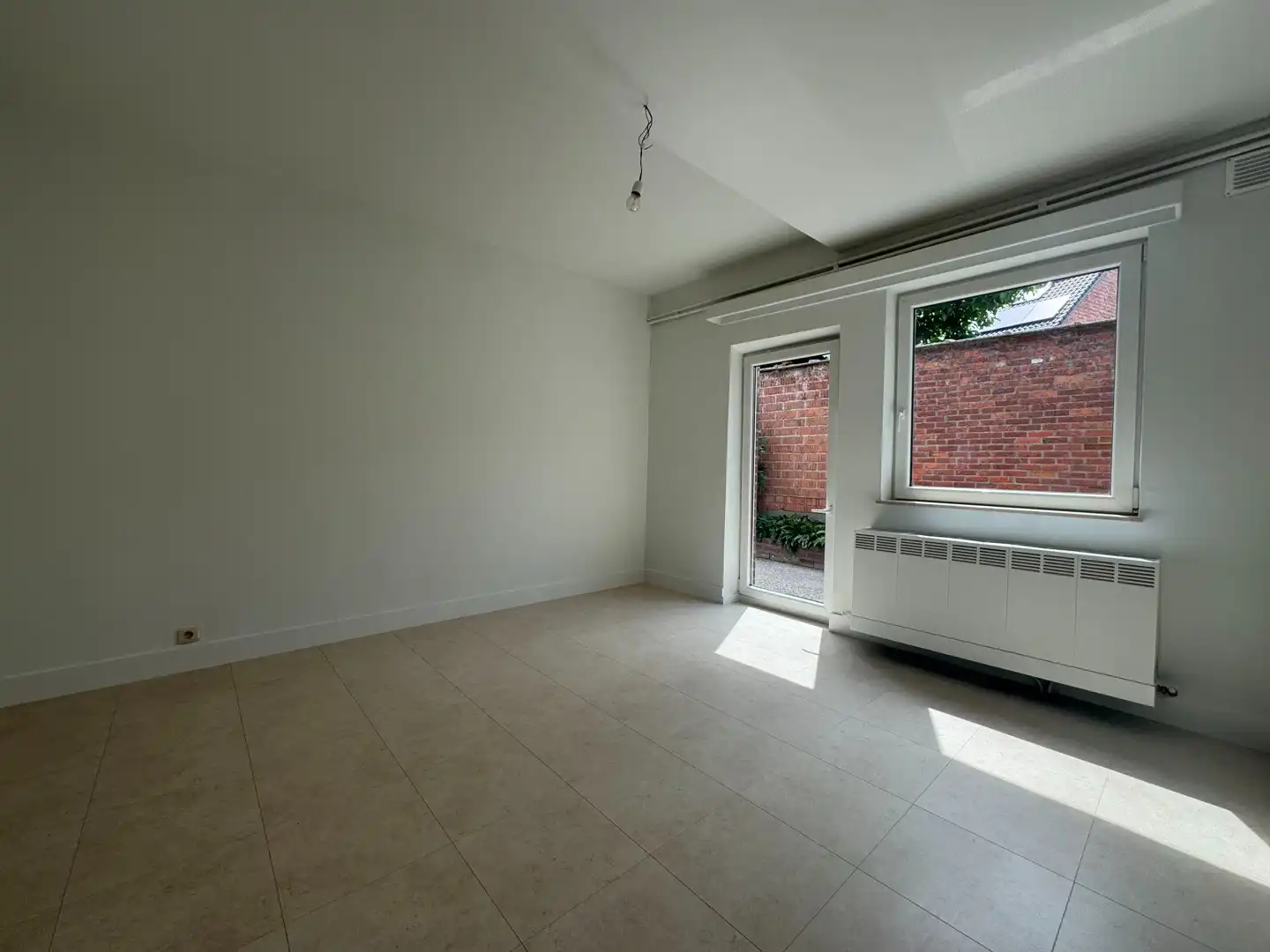 Ruim gerenoveerd gelijkvloers appartement met dubbele garage in het centrum van Diepenbeek foto 12