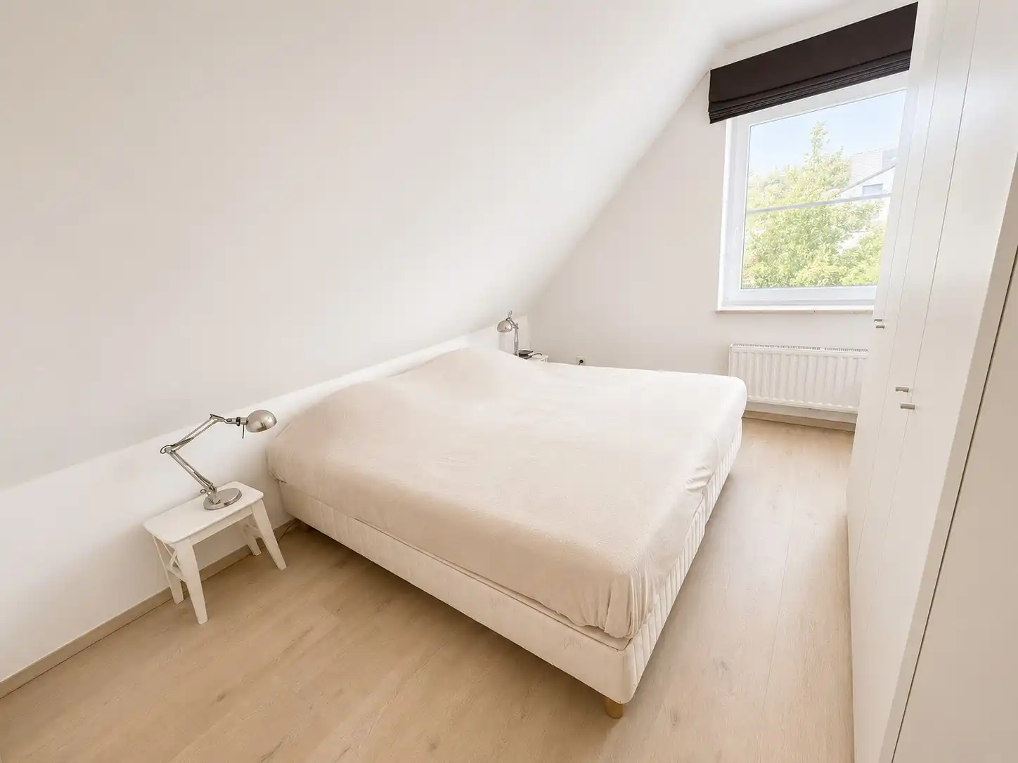 Recent, energiezuinig en tot in de puntjes afgewerkt: deze prachtige BEN-woning uit 2021 combineert modern wooncomfort met een rustige en groene ligging. foto 9