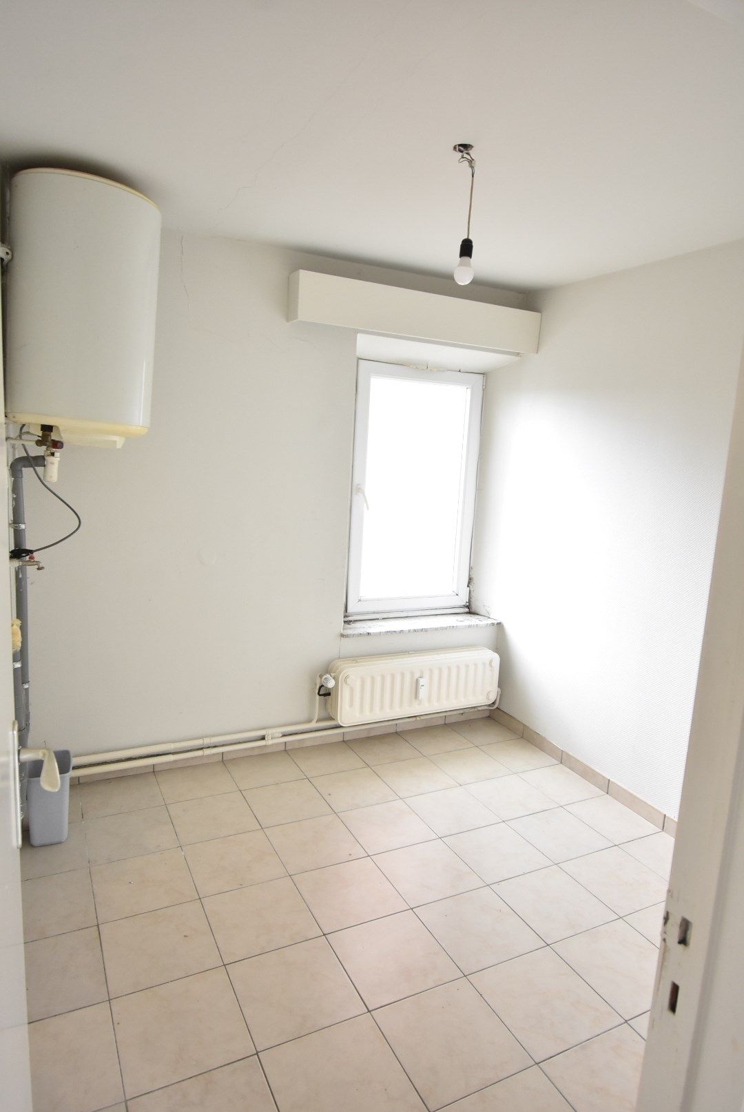 IN OPTIE - Degelijk appartement met 2 slaapkamers in centrum Hoeselt foto 11