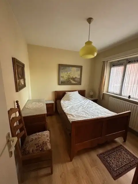 Ruim appartement met prachtig zicht op het marktplein in hartje Neerpelt! foto 13