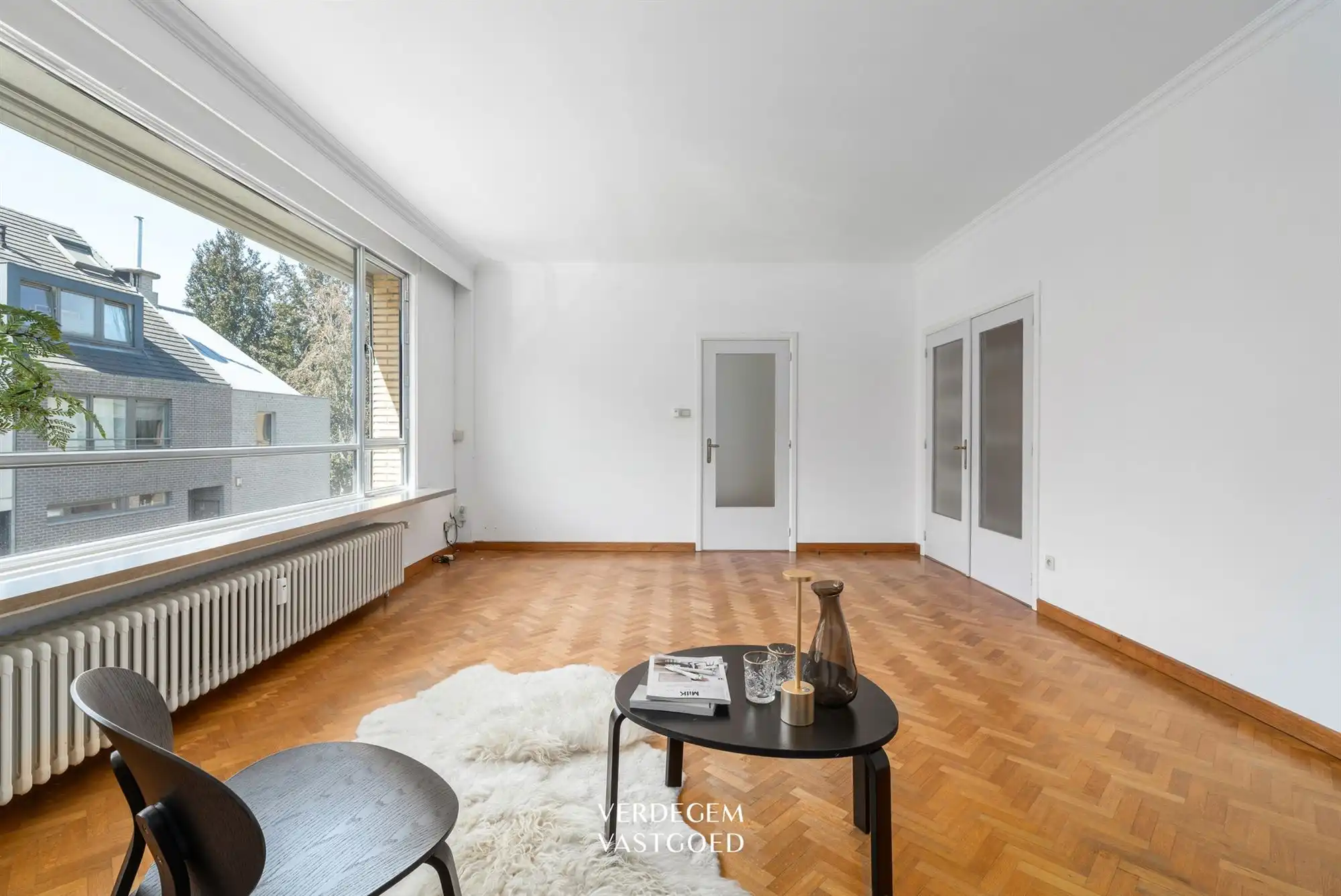 Lichtrijk en ruim appartement met 2 slaapkamers, terras en garage foto 3