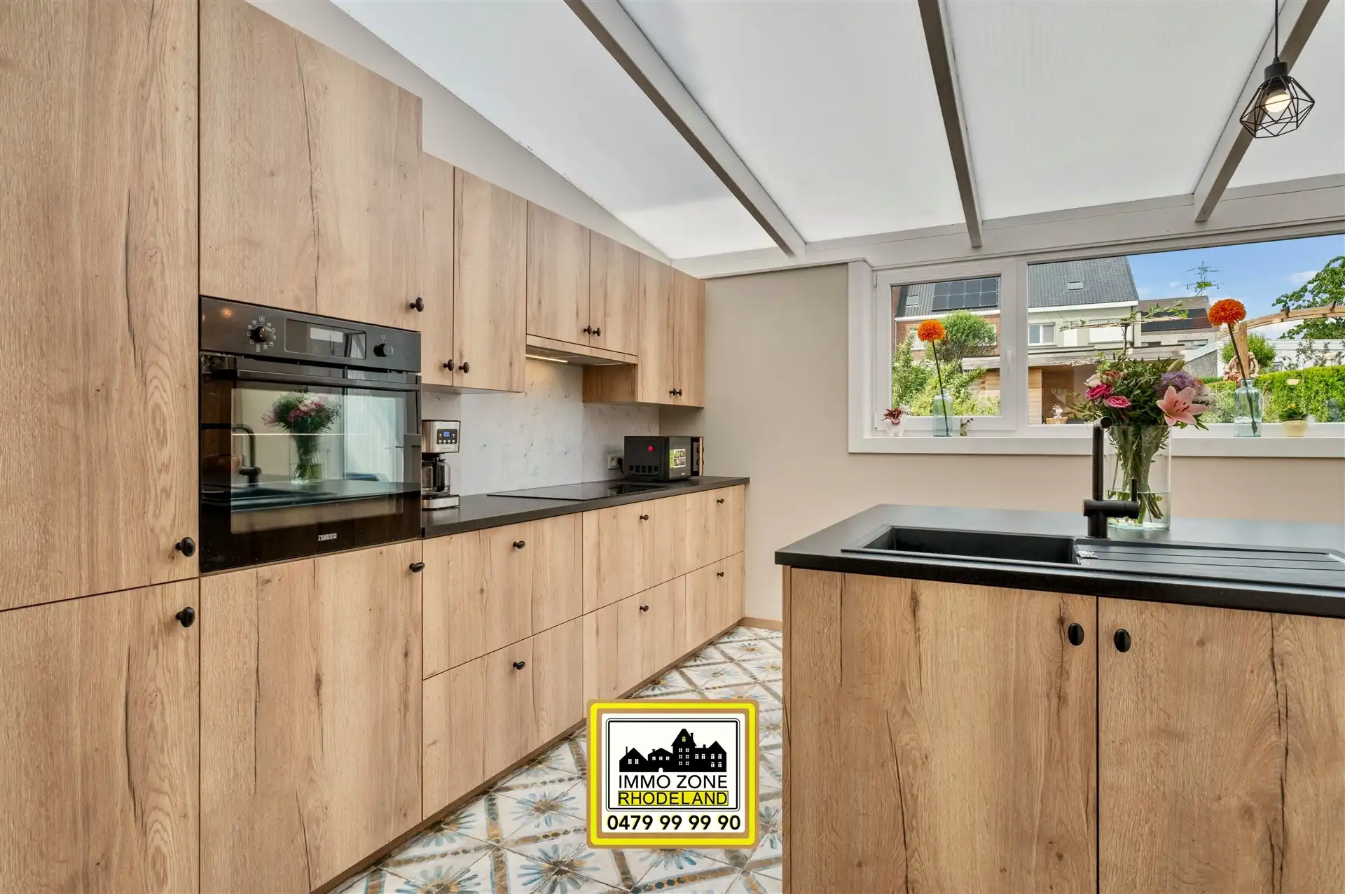 Instapklare woning met 3 slpks, 2 bdks, garage en tuin foto 16
