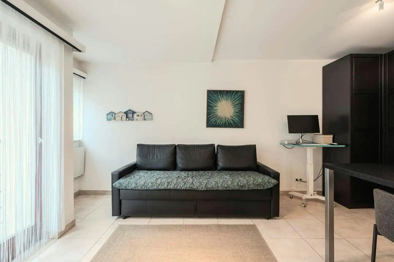 Lichtrijke studio met slaaphoek en terras te koop! foto 5