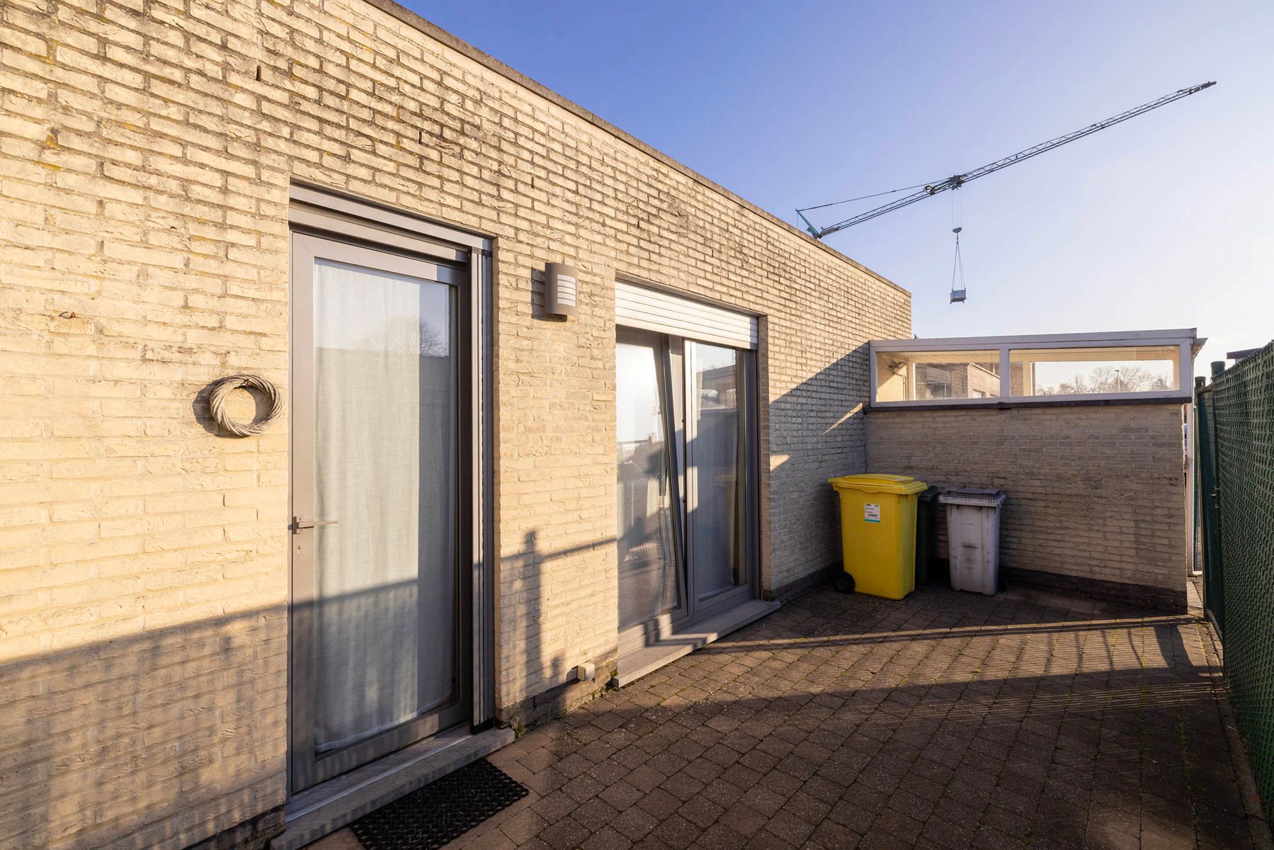 GLV app (132m²) met 2slpk, terras, garagebox en kelder foto 18