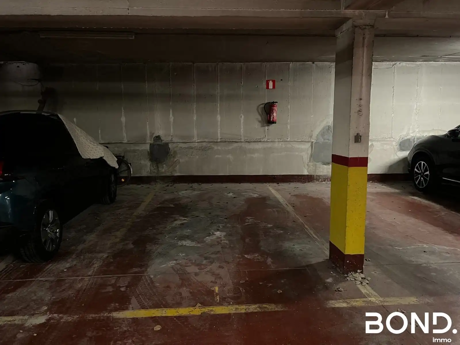 Ondergrondse autostostaanplaats te huur in het centrum van Leuven foto {{pictureIndex}}