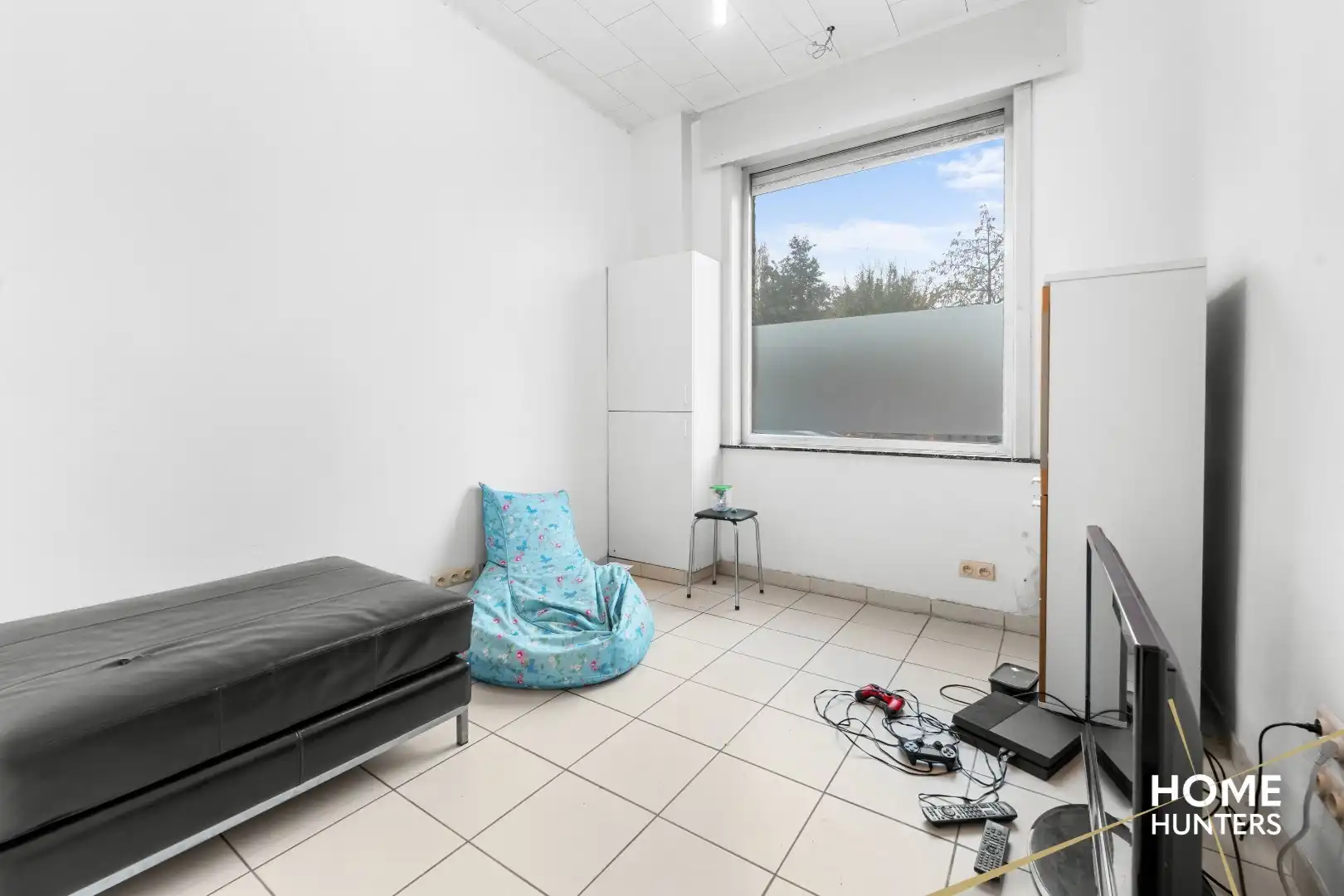 Charmante, op te frissen rijwoning met ruime tuin en 3 slaapkamers foto 7