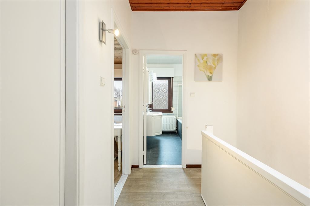 Gezellige woning met ruime garage en stadskoer foto 12