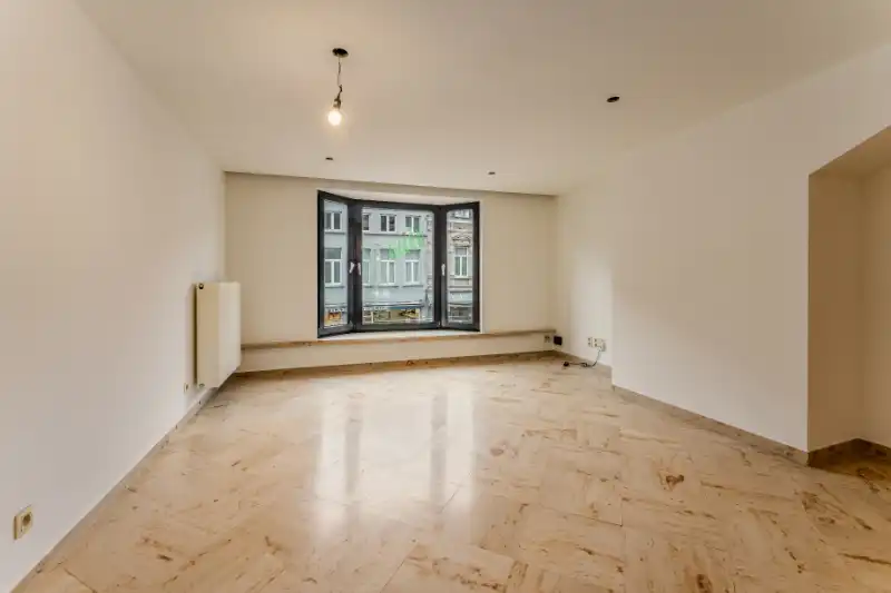 Genoveerd appartement met drie slaapkamers en groot terras foto 3