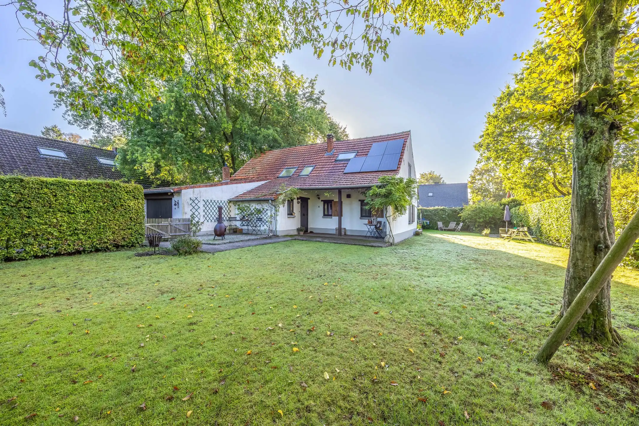 Sfeervolle hoevewoning in groene omgeving te Zoersel foto {{pictureIndex}}
