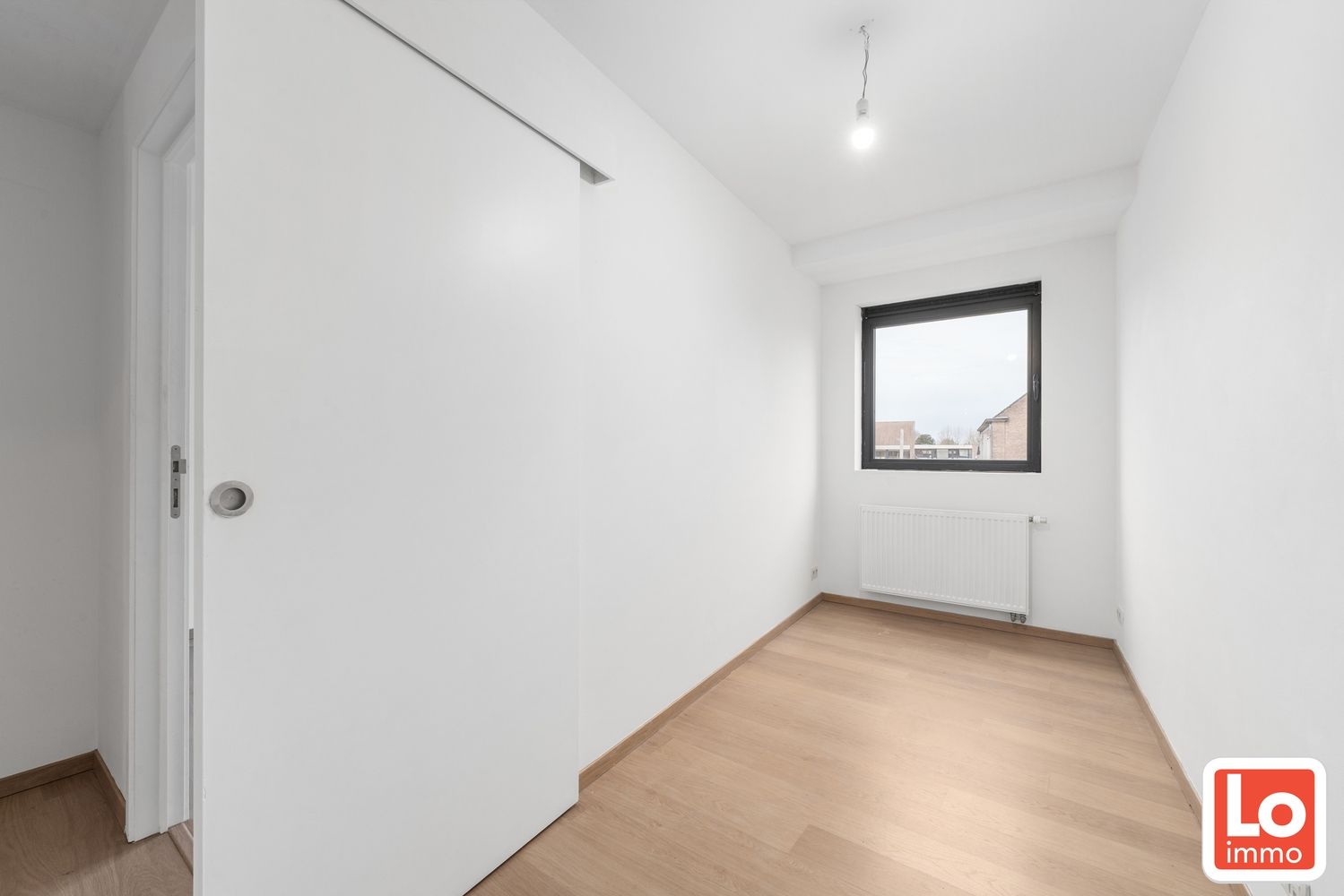 Mooi appartement met 2 slaapkamers, zuid-gericht terras en autostaanplaats in Centrum Lochristi foto 7