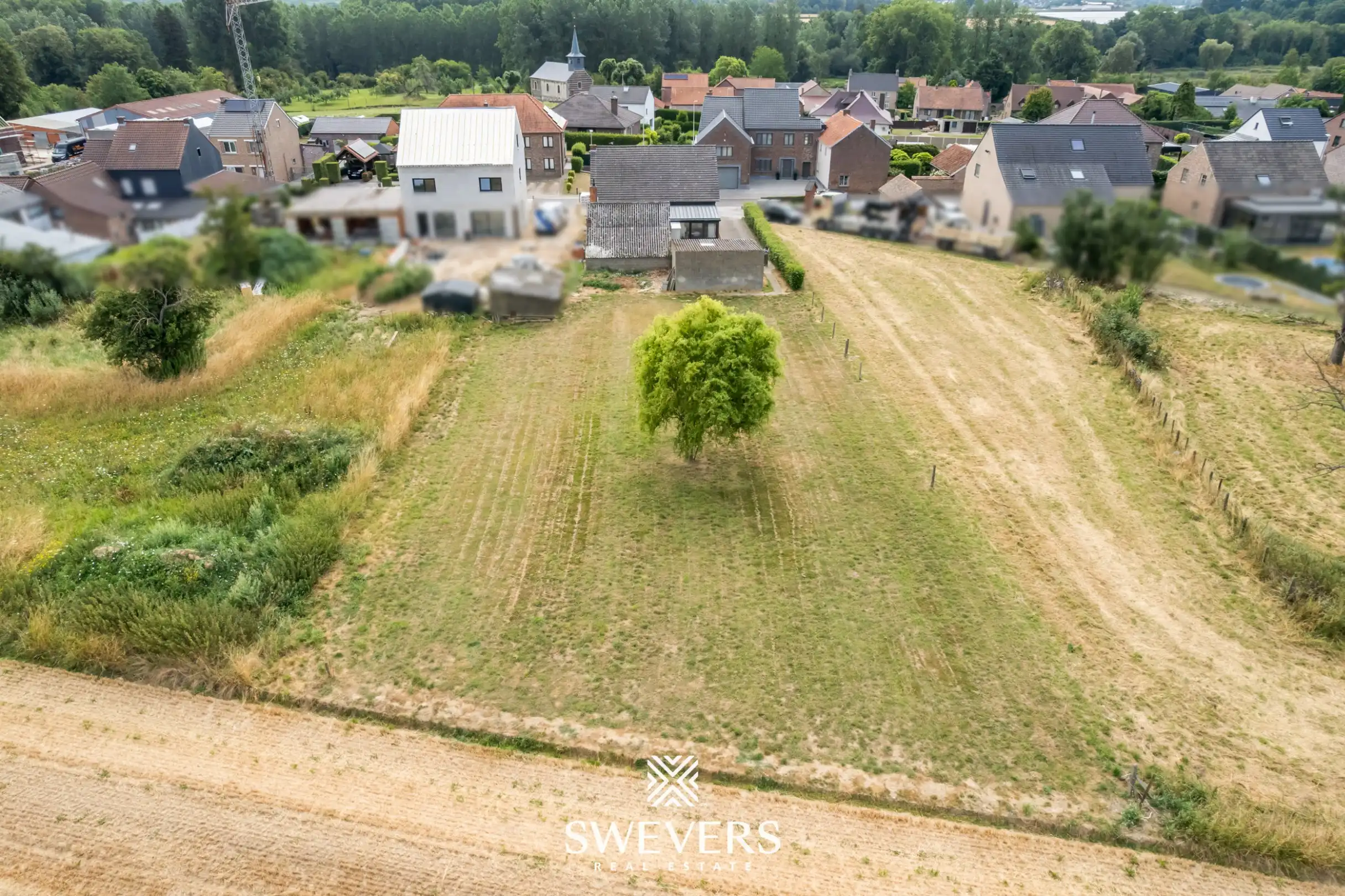 Ruime open bebouwing met 4 slaapkamers, grote garage en zonnig perceel van 15 are 28 ca foto 22