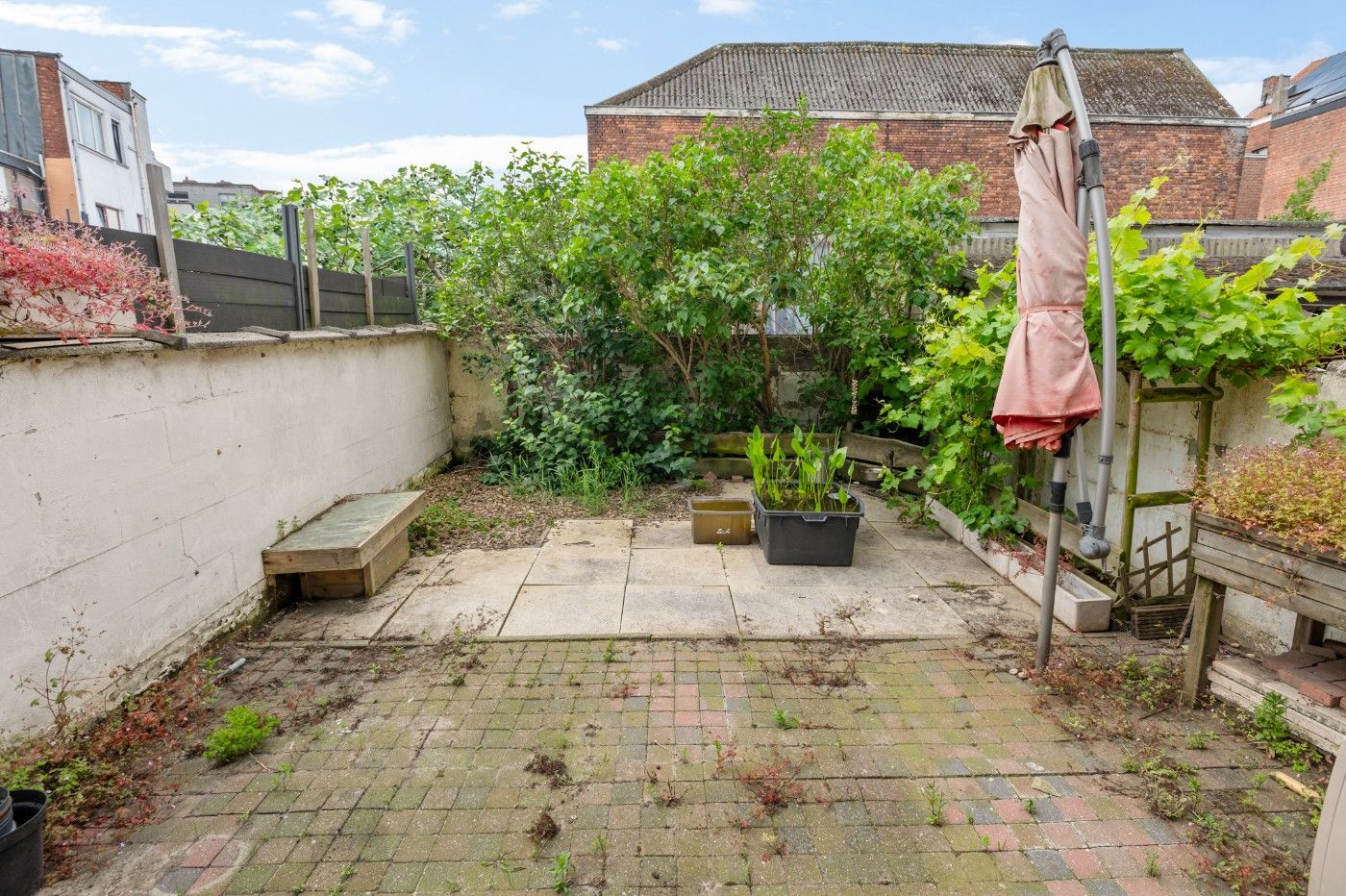 Op te frissen woning met 2 à 3 slpk. en gezellige stadstuin foto 22